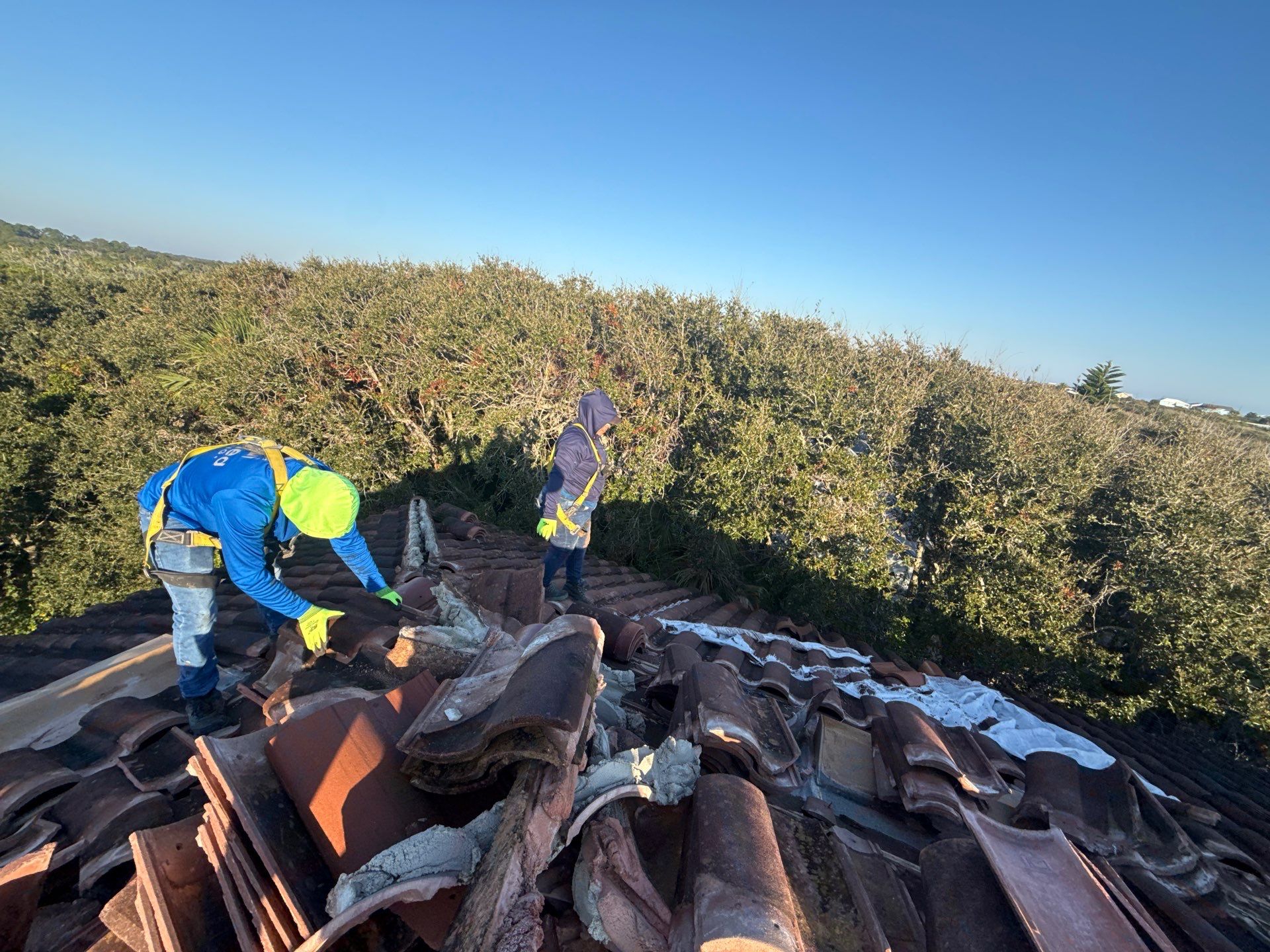 Flagler Beach Residential Tile Roof Replacement with Dark Barrel Tiles by Fortified Roofing Solutions Corp.