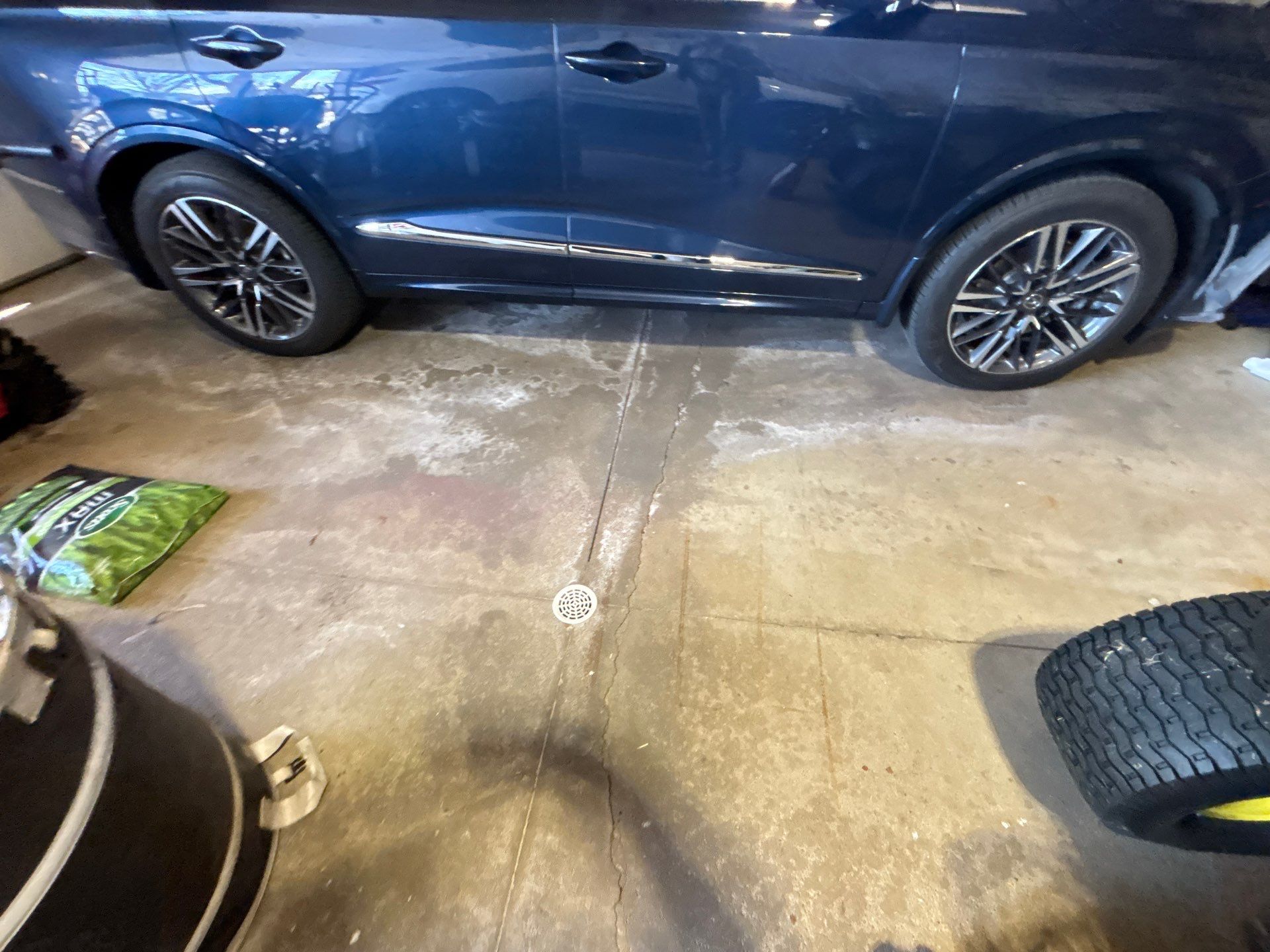 Sioux Falls Garage Concrete Repair and Epoxy Flake Floor Coating by Select Painting, Coatings & Garage Cabinets