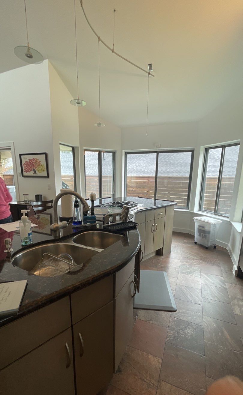 Modern & Clean Kitchen by SLM General Contractors & Roofing