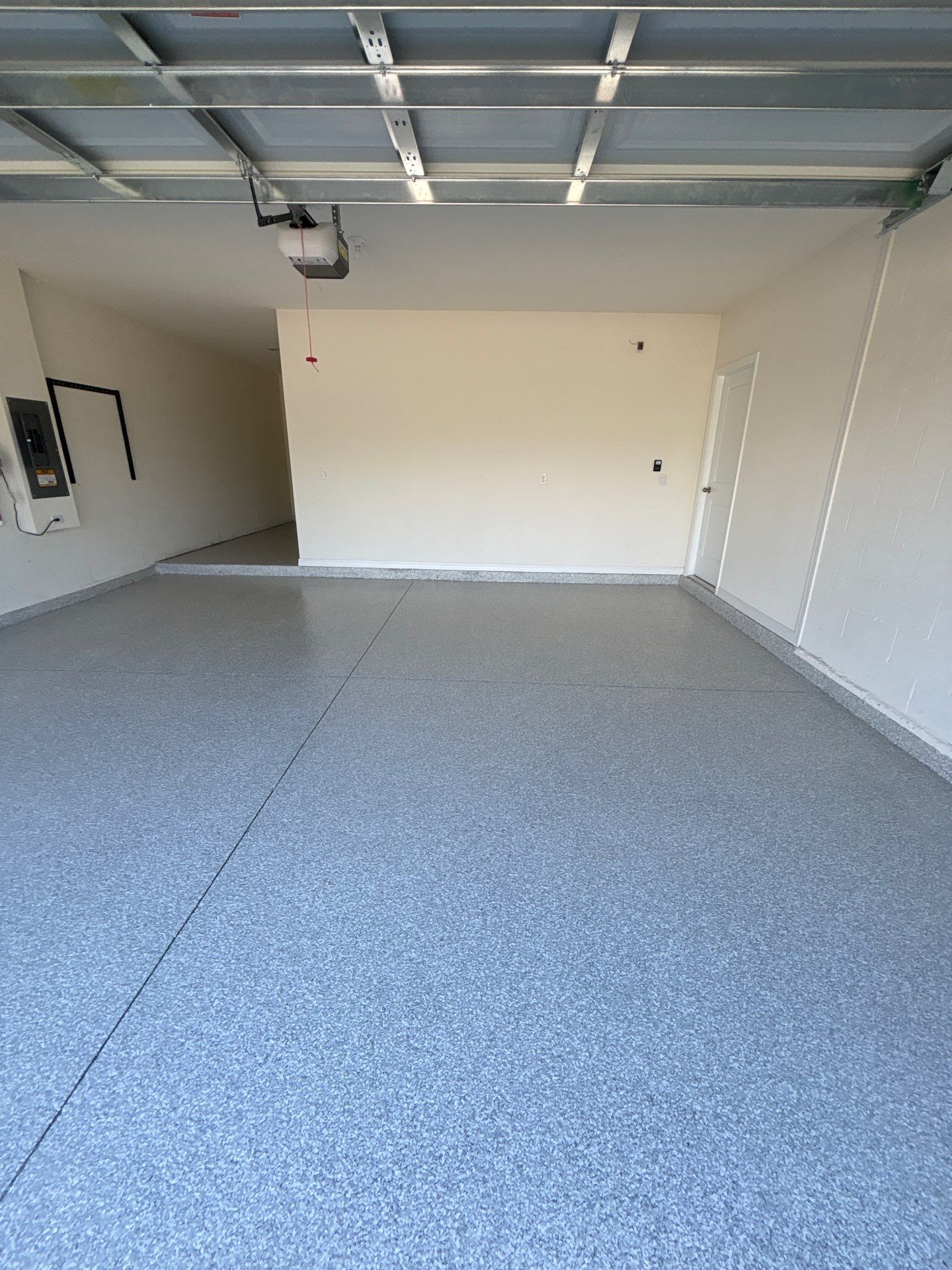Flake Epoxy Garage Floor Coating System in Zephyrhills by Performance Floors & Coating