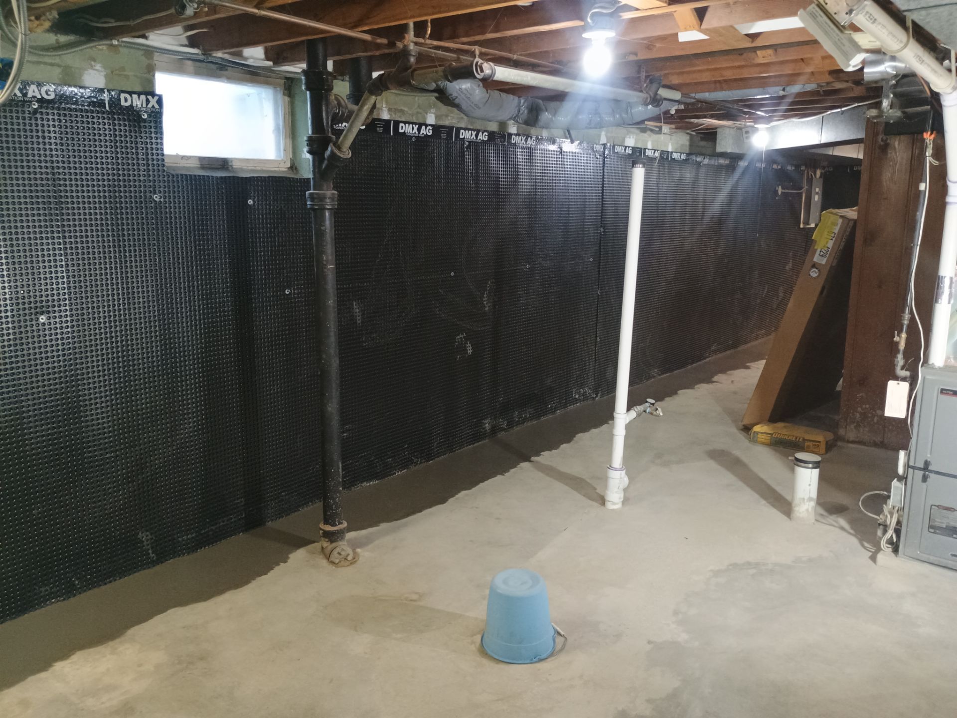 Interior Drain Tile & Wall Drainage in Southwest Minneapolis by Waterproofing Northeast