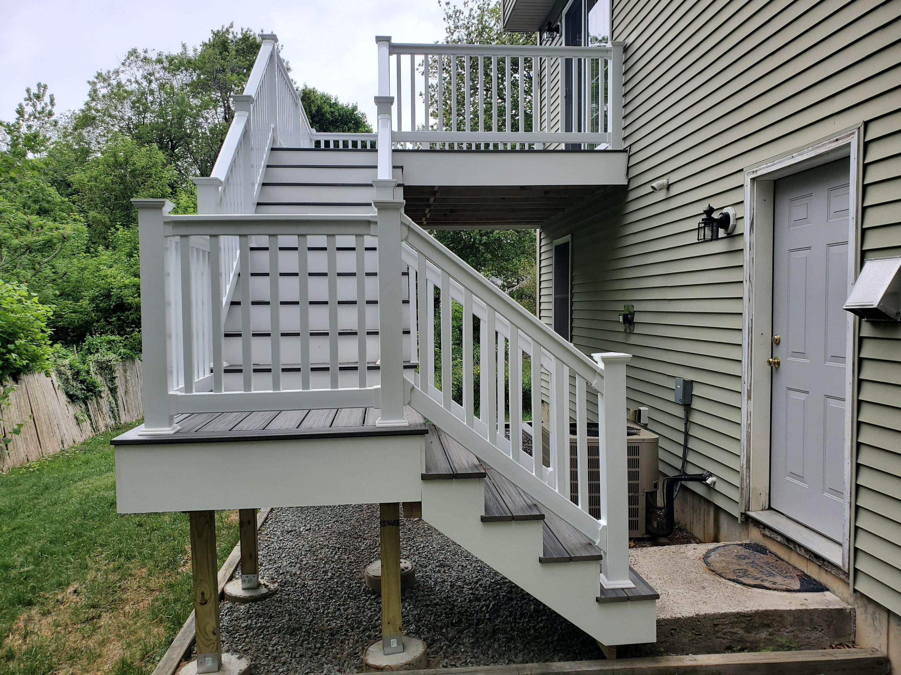 Porch/Deck Construction using Trex Decking by UBrothers Construction