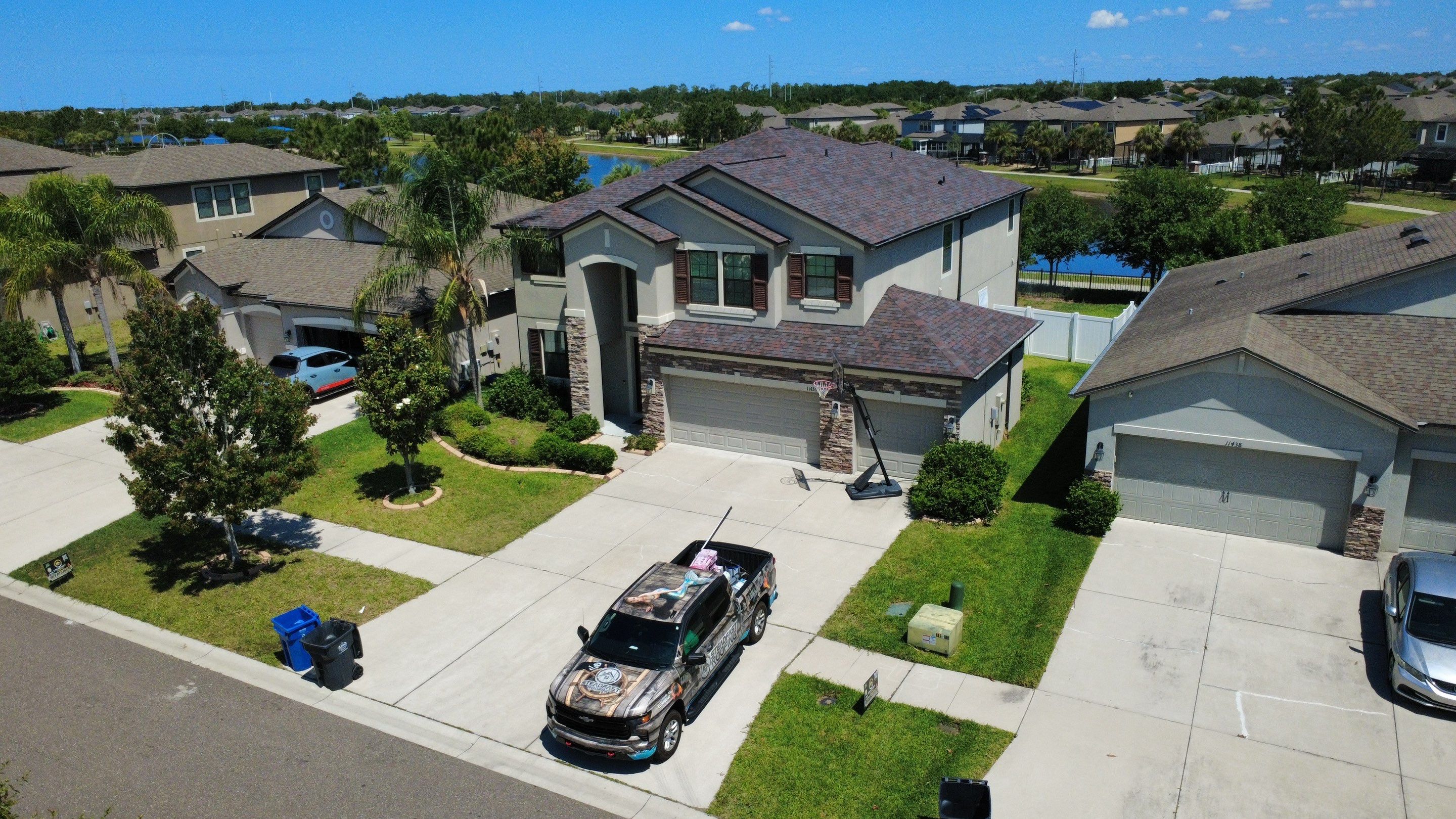 Riverview Two-Story Home Roof Replacement Featuring Owens Corning Merlot Shingles by Steadfast Roofing
