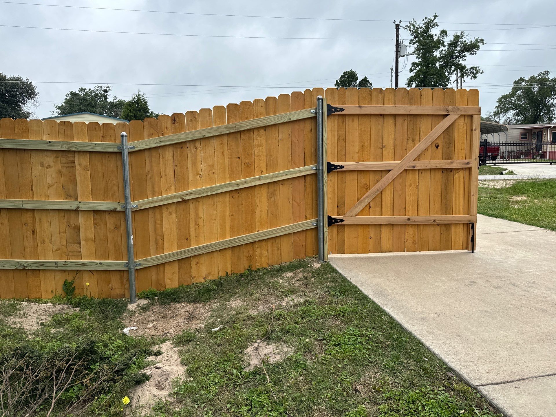 Elgin New Wood Fence Installation by Rhino Home Care