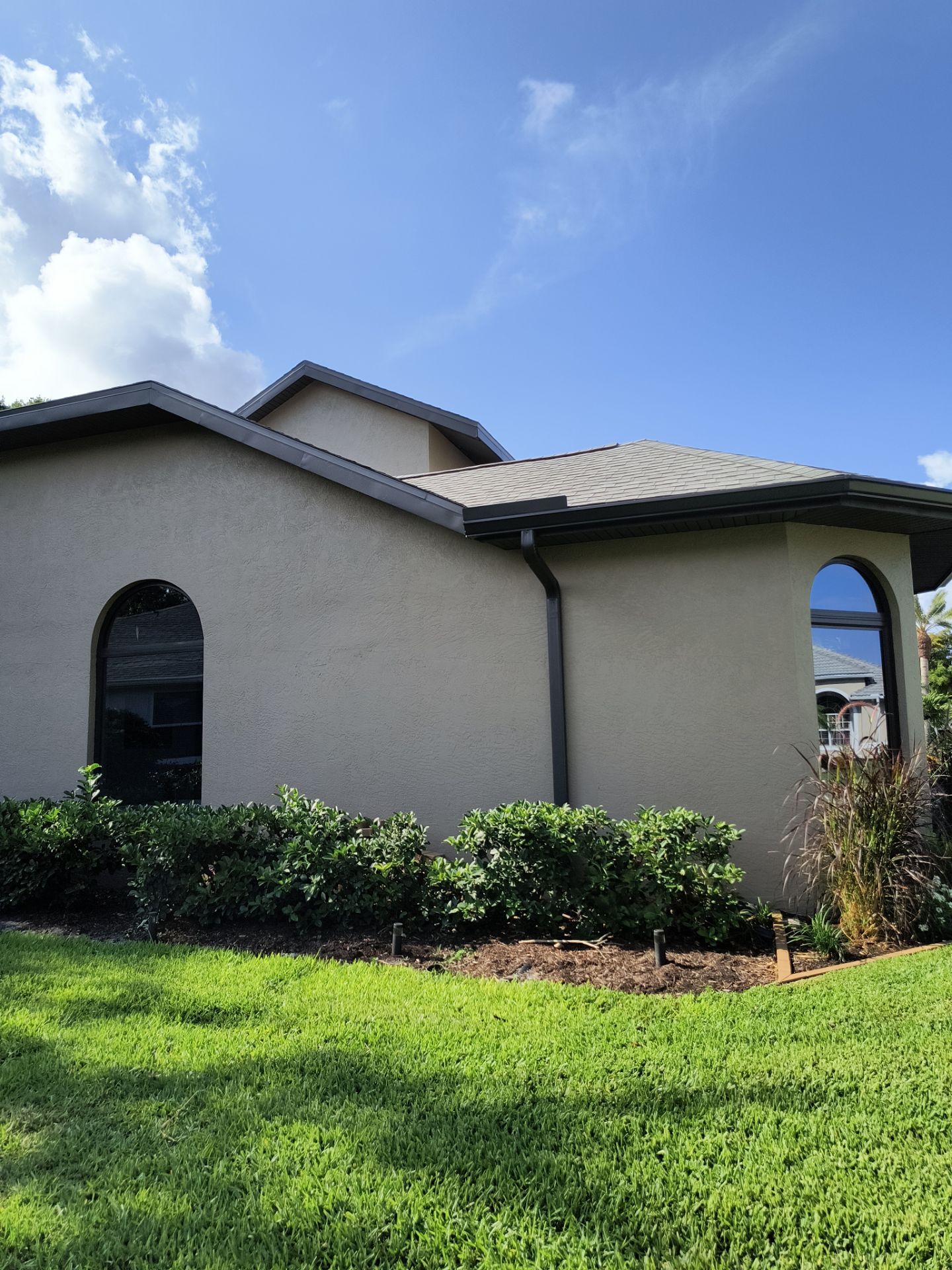 Black Seamless Gutters in Sarasota FL by Gutter Professors