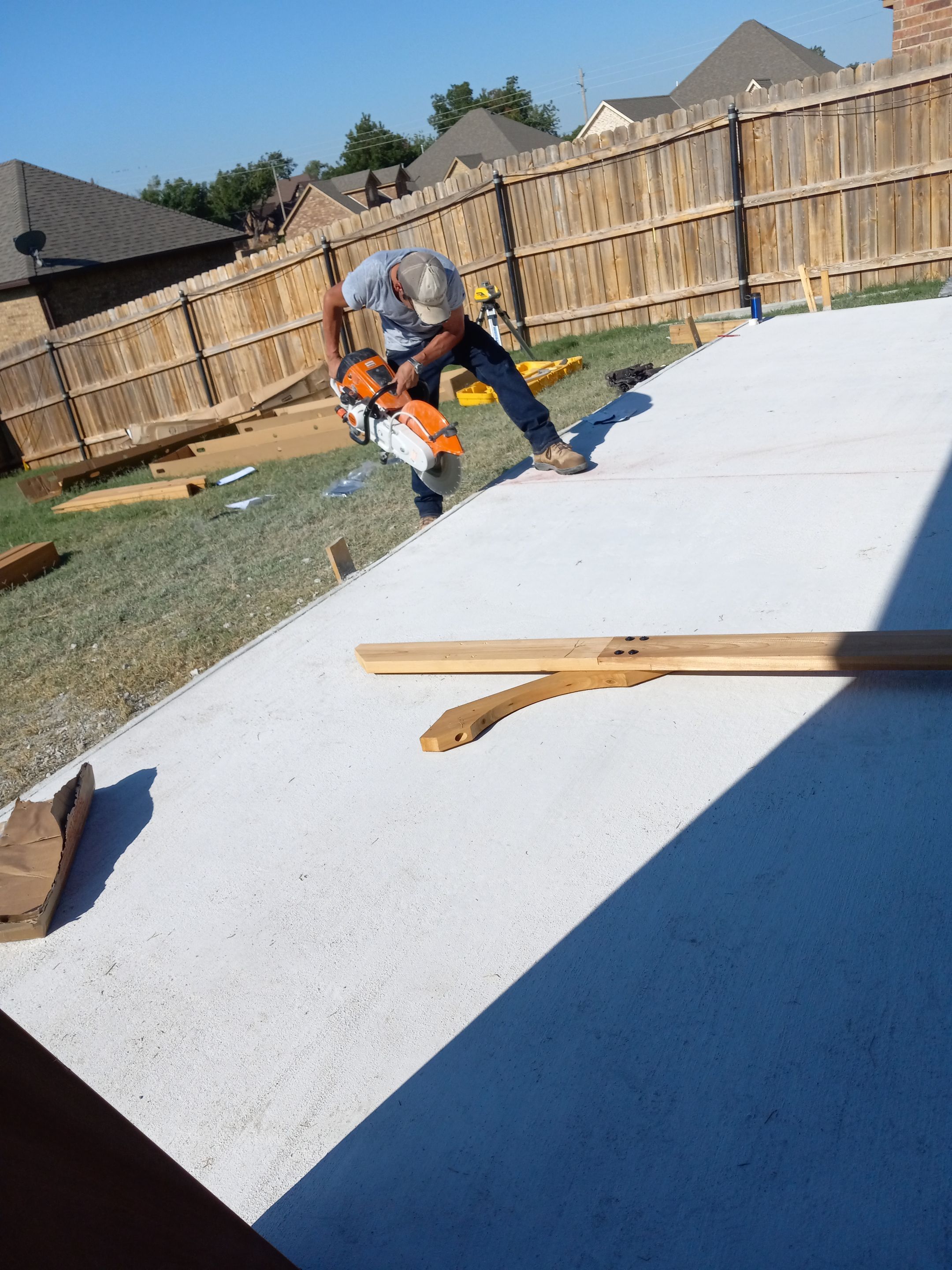 Concrete slab with Pergola by Clays Services Inc