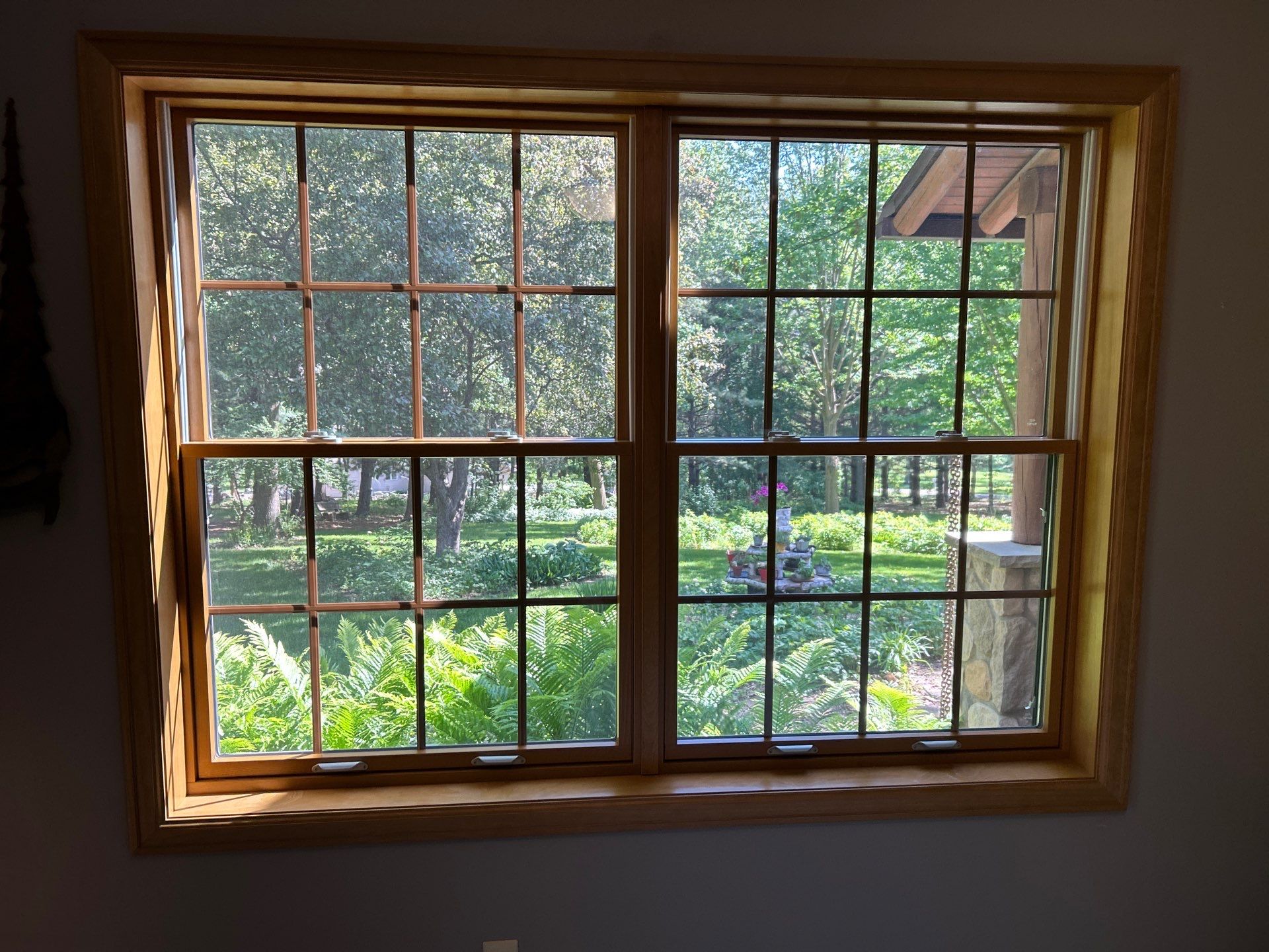 Pella Window installation using Pella Lifestyle wood/Aluminum window by United Windows and Siding LLC