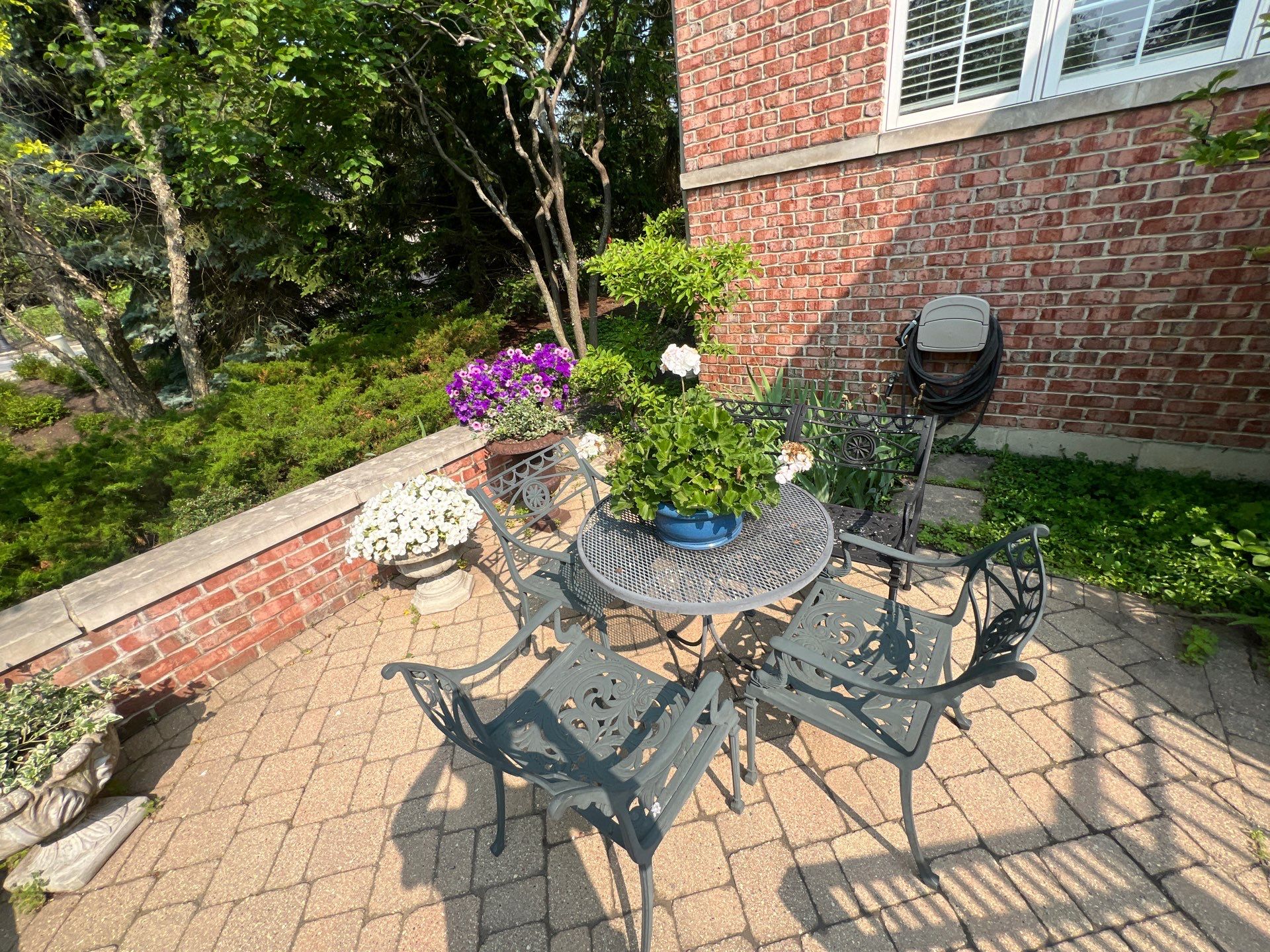Brick paver cleaning sanding and sealing by Northern Power Washing LLC.