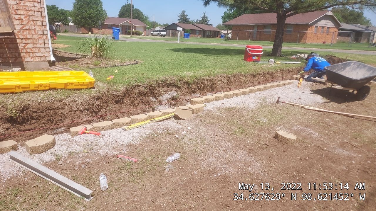 Retaining Wall using Rocks by Clays Services Inc