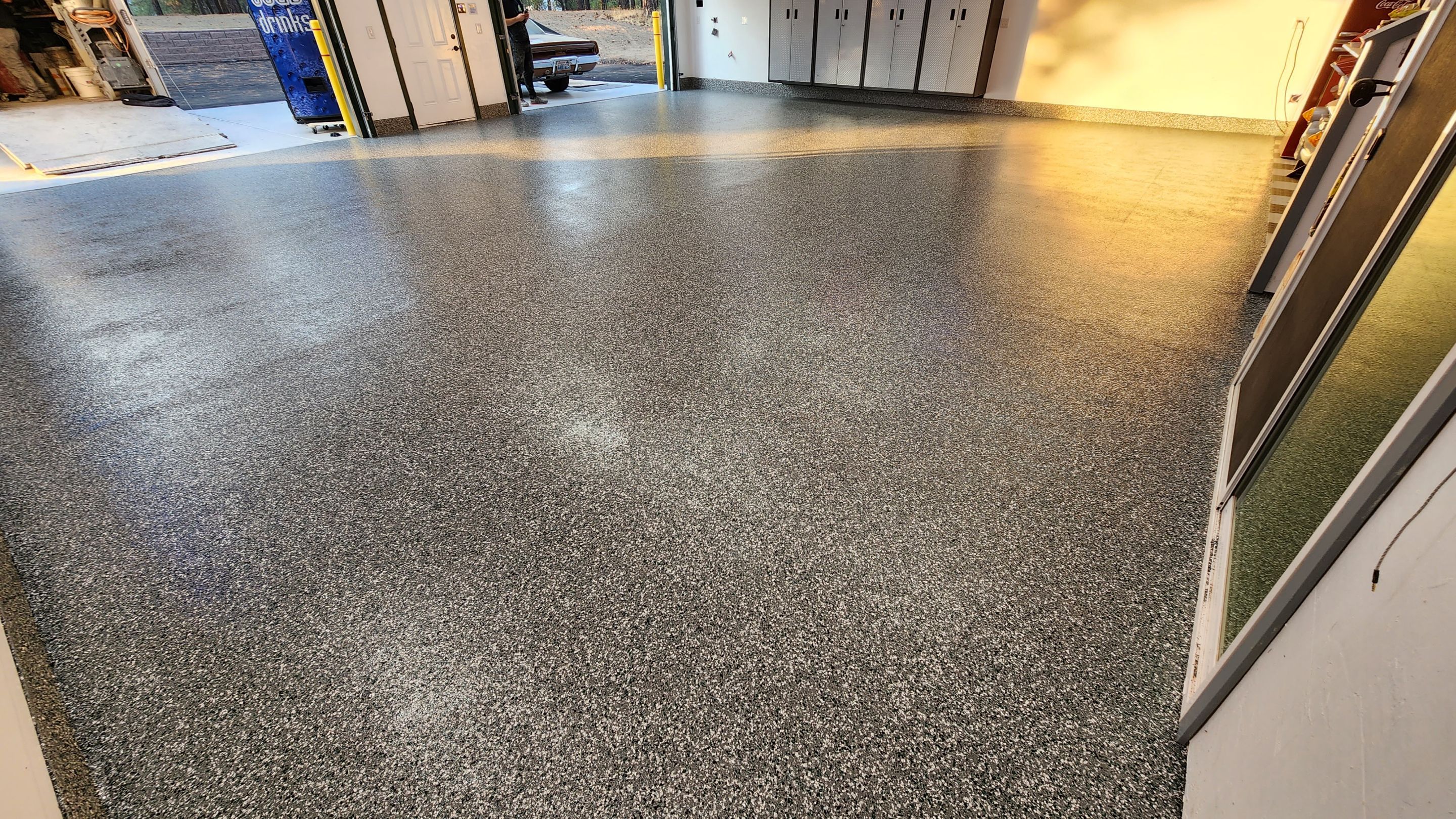 Garage Transformation using Domino with Blue by Croc Coatings, LLC
