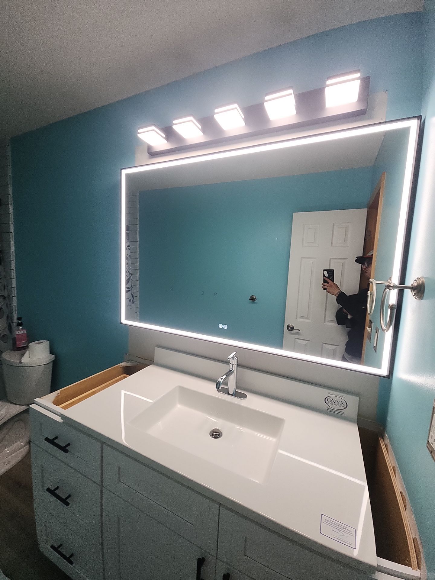 Bathroom Remodel using Luxury Vinyl Plank by The Shower Company