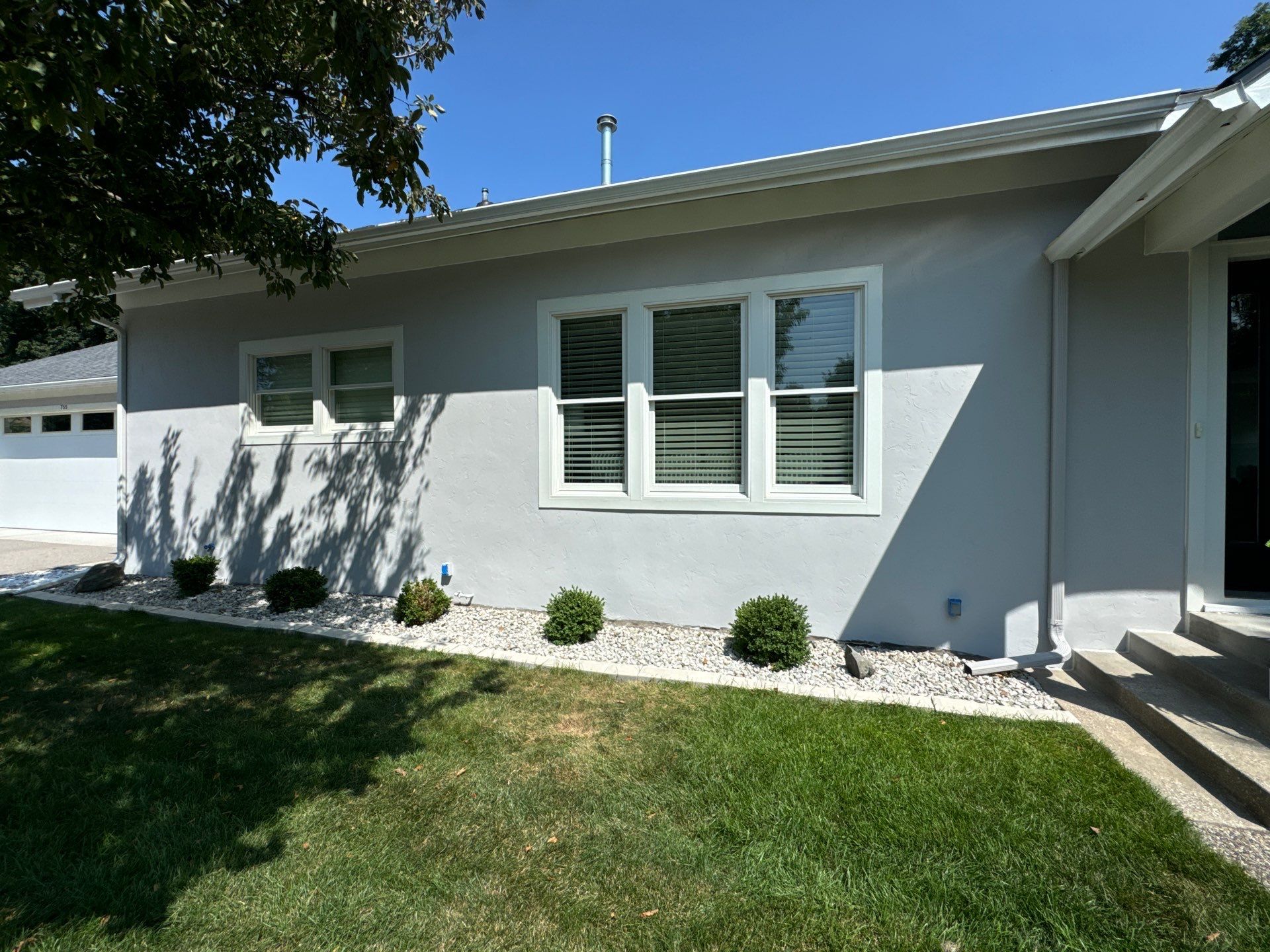 Norton Shores Residential Stucco Repair and Exterior Painting Refresh by Gordon Painting