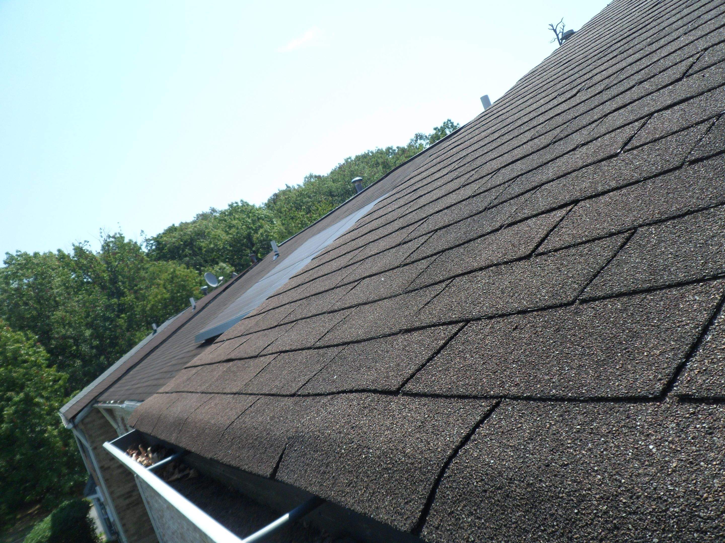 Residential Roofing Installation using Landmark Shingles Color Weatherwood by Alpha Design Services