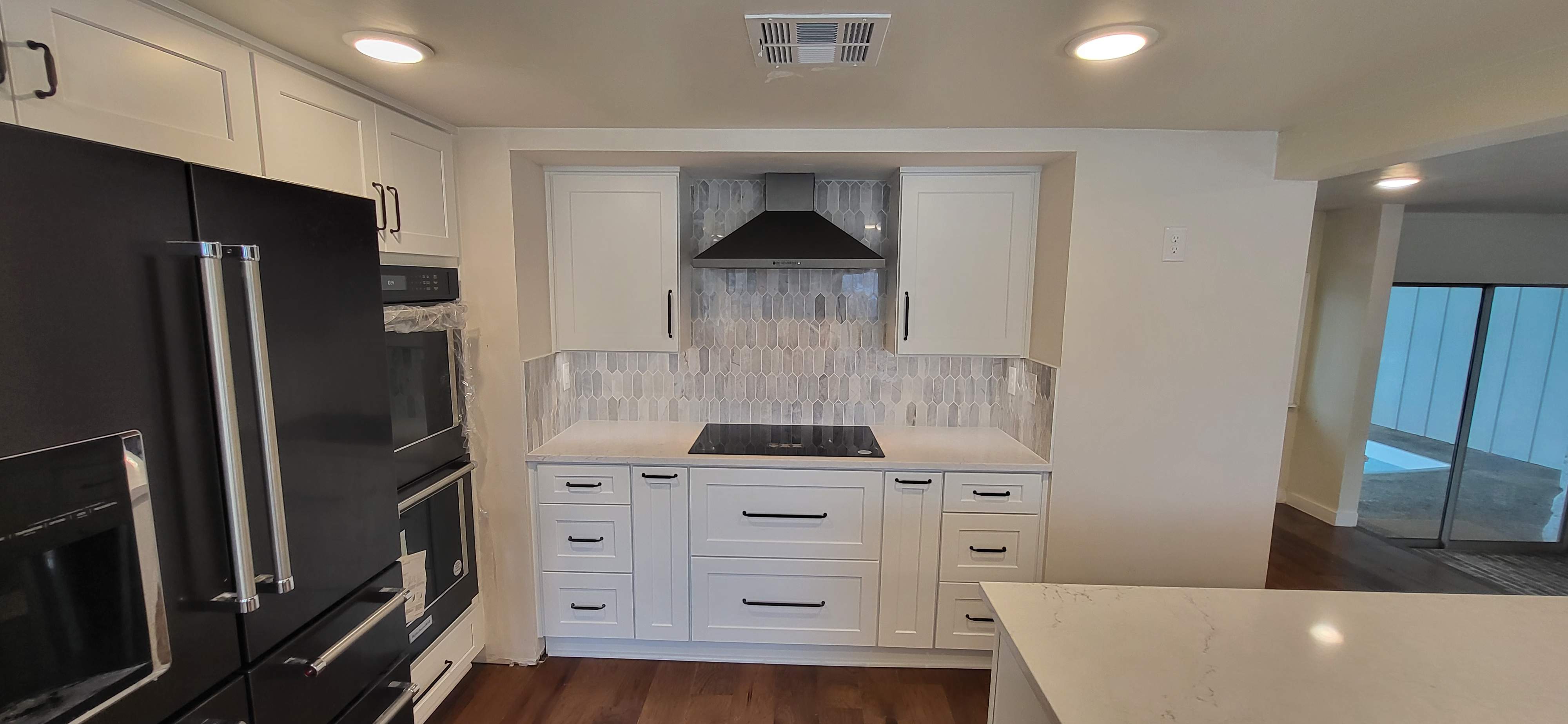 Boerne Kitchen Remodel with Quartz Countertops and White Shaker Cabinets by Legacy Bath and Kitchen