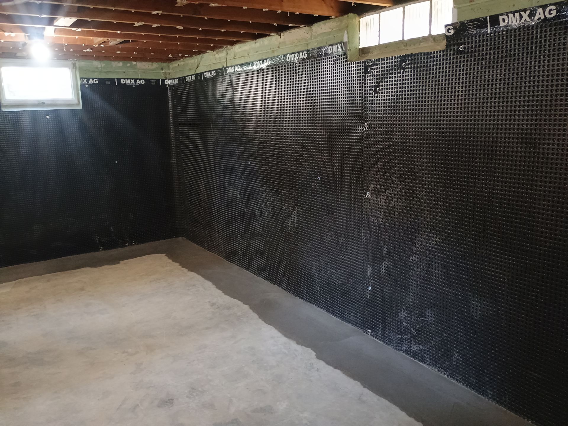 Interior Drain Tile & Wall Drainage in Southwest Minneapolis by Waterproofing Northeast