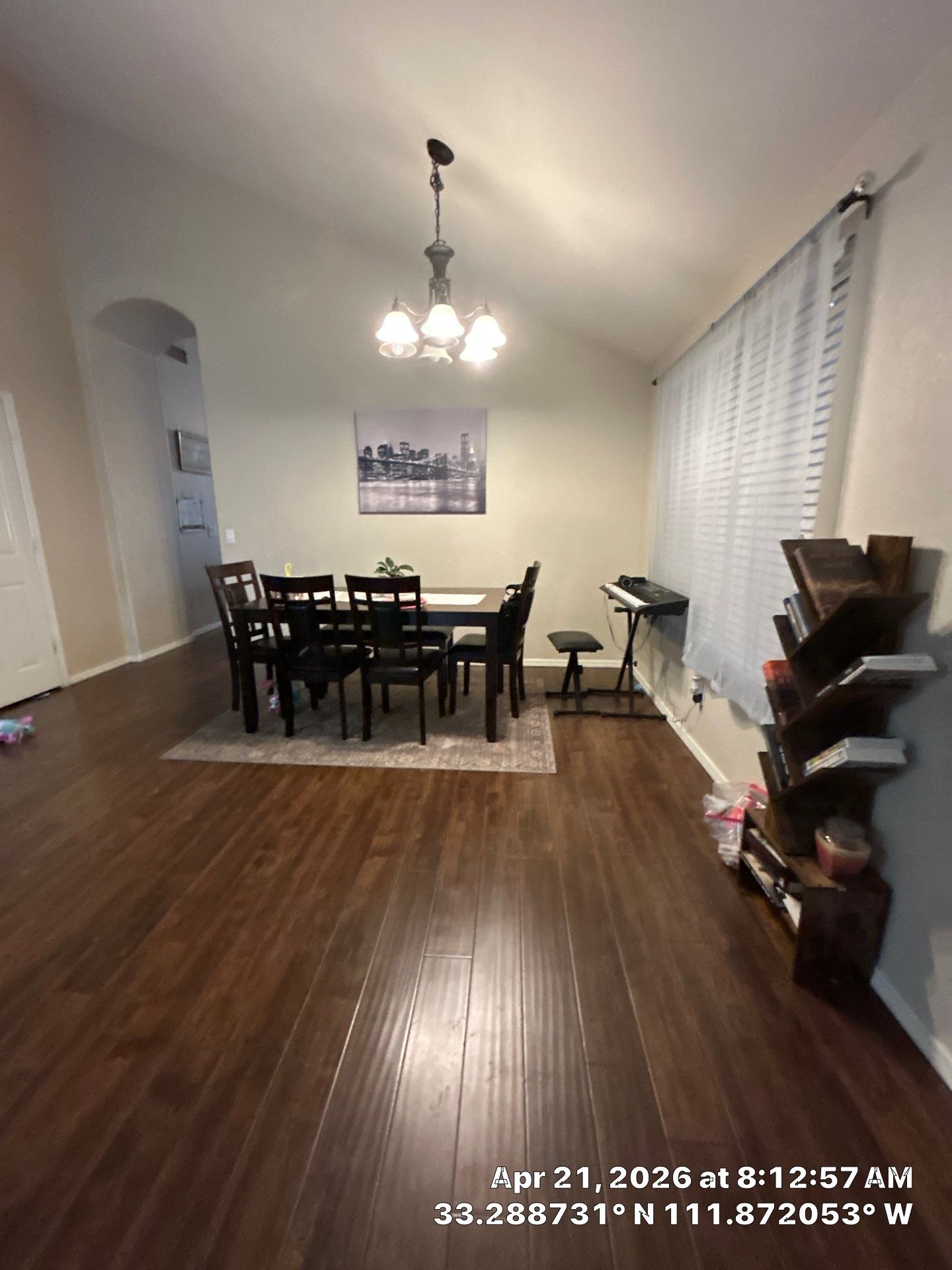 Dark Wood Laminate Floor Installation and Dining Room Renovation in Chandler by CompanyCam Sales Demo