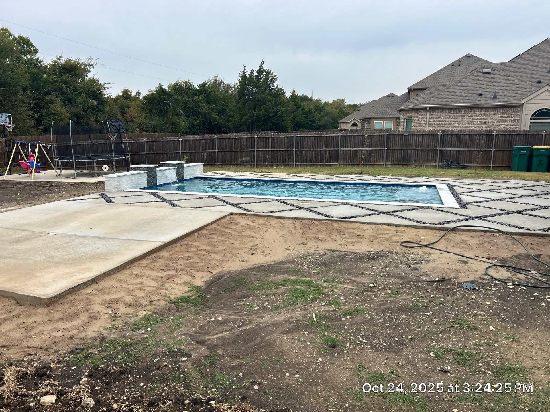 Modern Geometric Pool with Raised Wall and Paver Deck by Pinnacle Pools and Spas - DFW