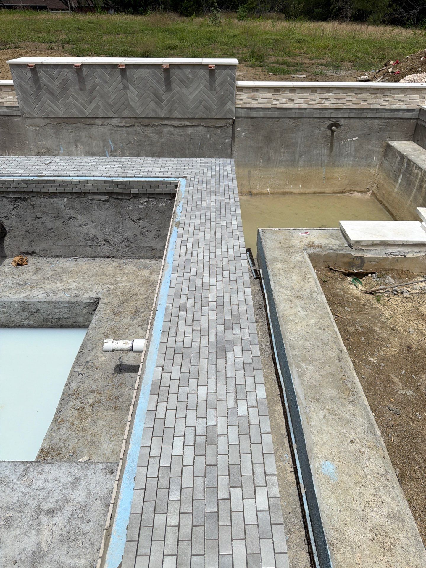 Modern Geometric Pool with Raised Spa and Tanning Ledge by Pinnacle Pools and Spas - DFW