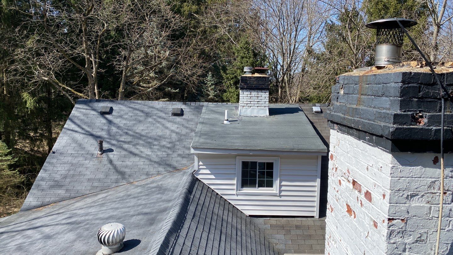 New CertainTeed Presidential Shake Roof with Standing Seam Accents  by Runyon & Sons Roofing