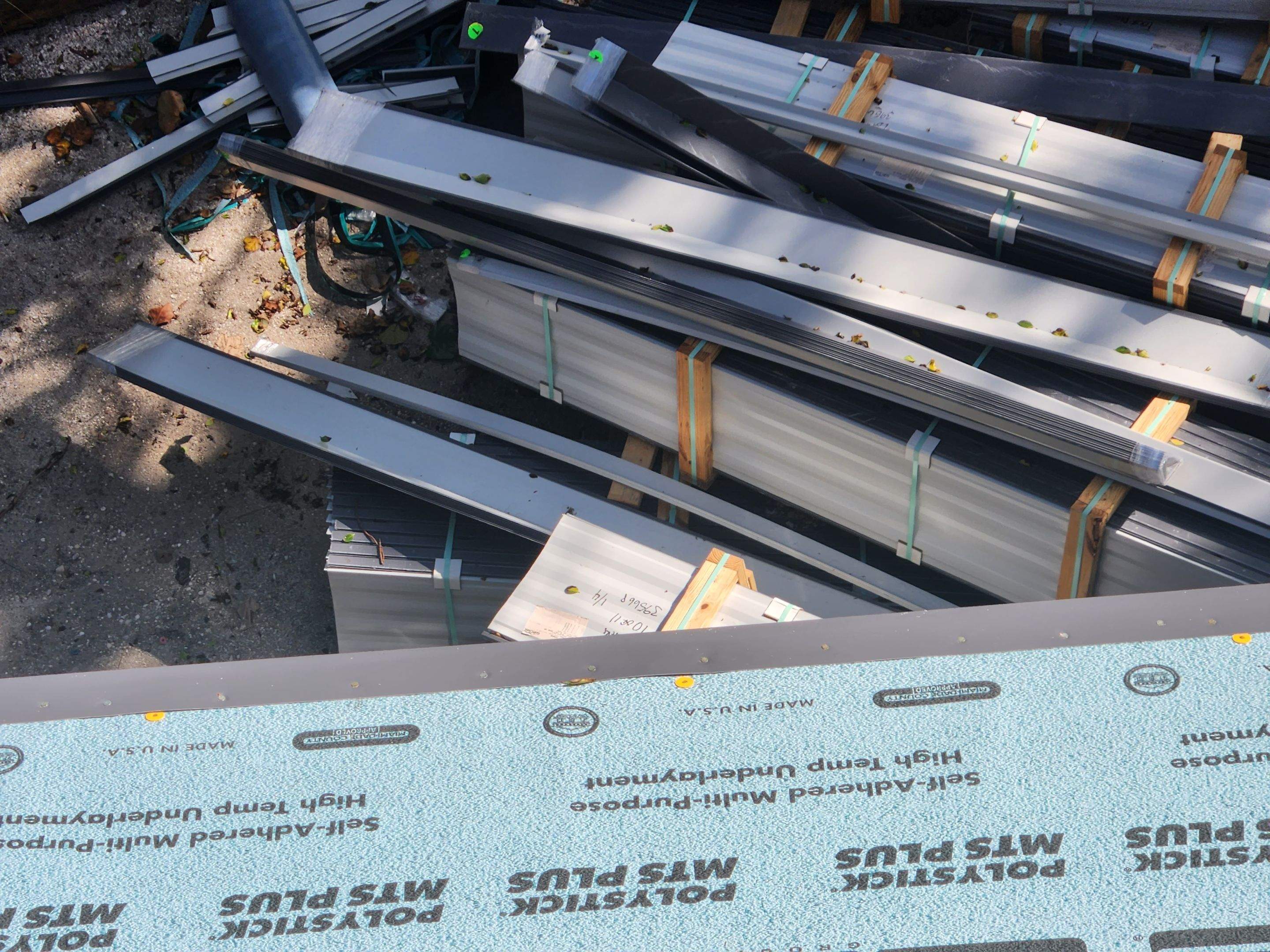 Residential Roofing Installation using Gulf Coast Metals Gulf Seam Panels by Four Peaks Roofing
