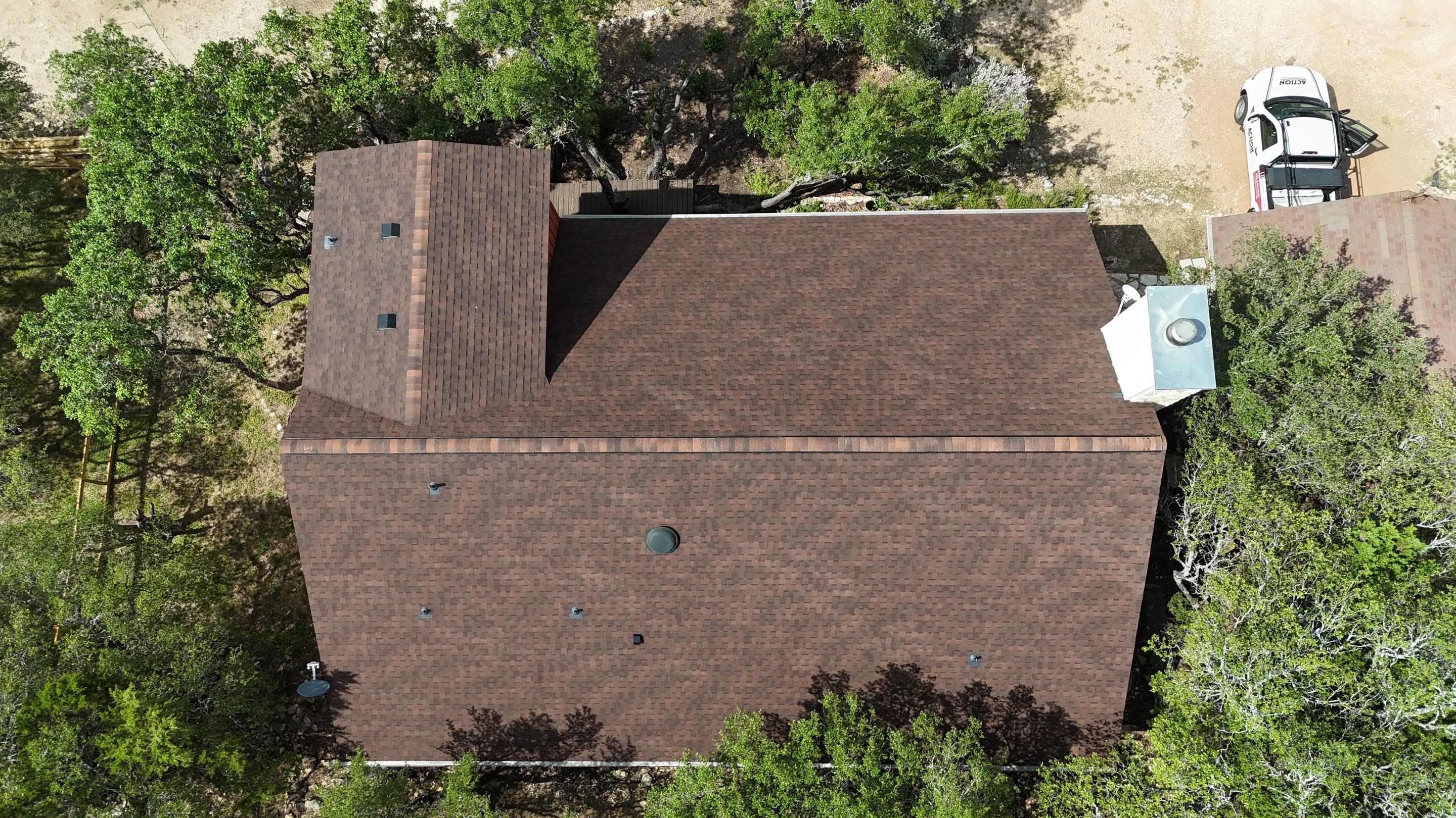 Residential Construction using TAMKO - Titan XT - Rustic Hickory by Action Exteriors Austin