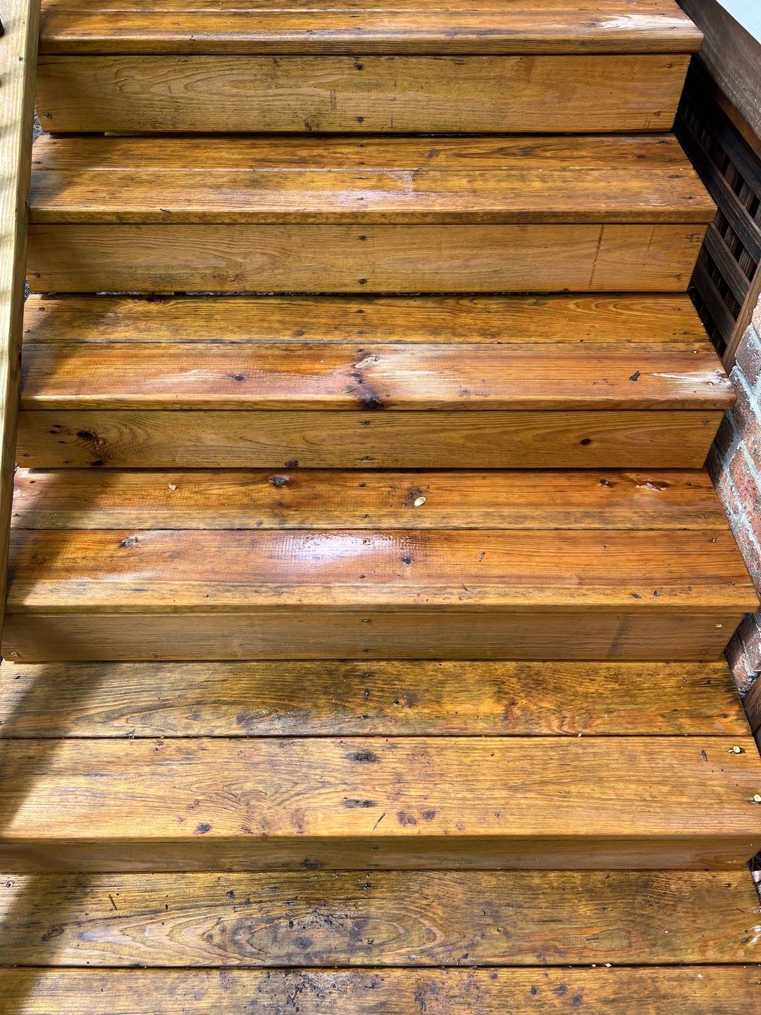 Deck and Stamped Concrete Patio by DuraSeal