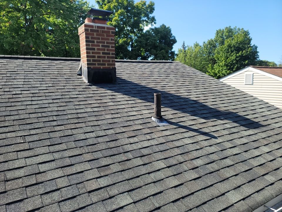 ATLAS PINNACLE COLOR: PRISTINE BLACK SHADOW DRIP EDGE: WHITE by Eagle Eye Roofing
