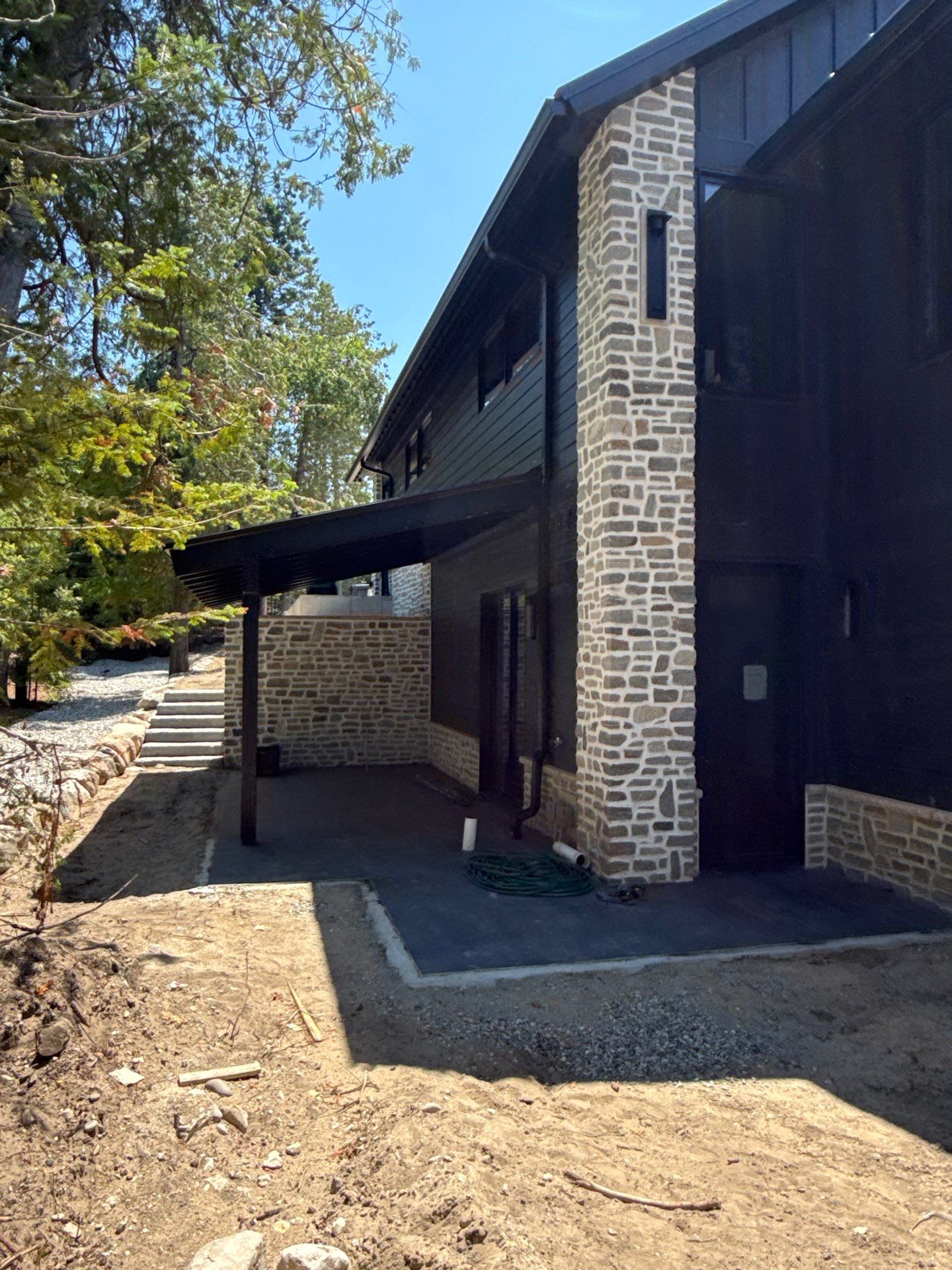 Gutter and Drainage System Installation for Modern Residential Build by Rainbow Seamless Systems