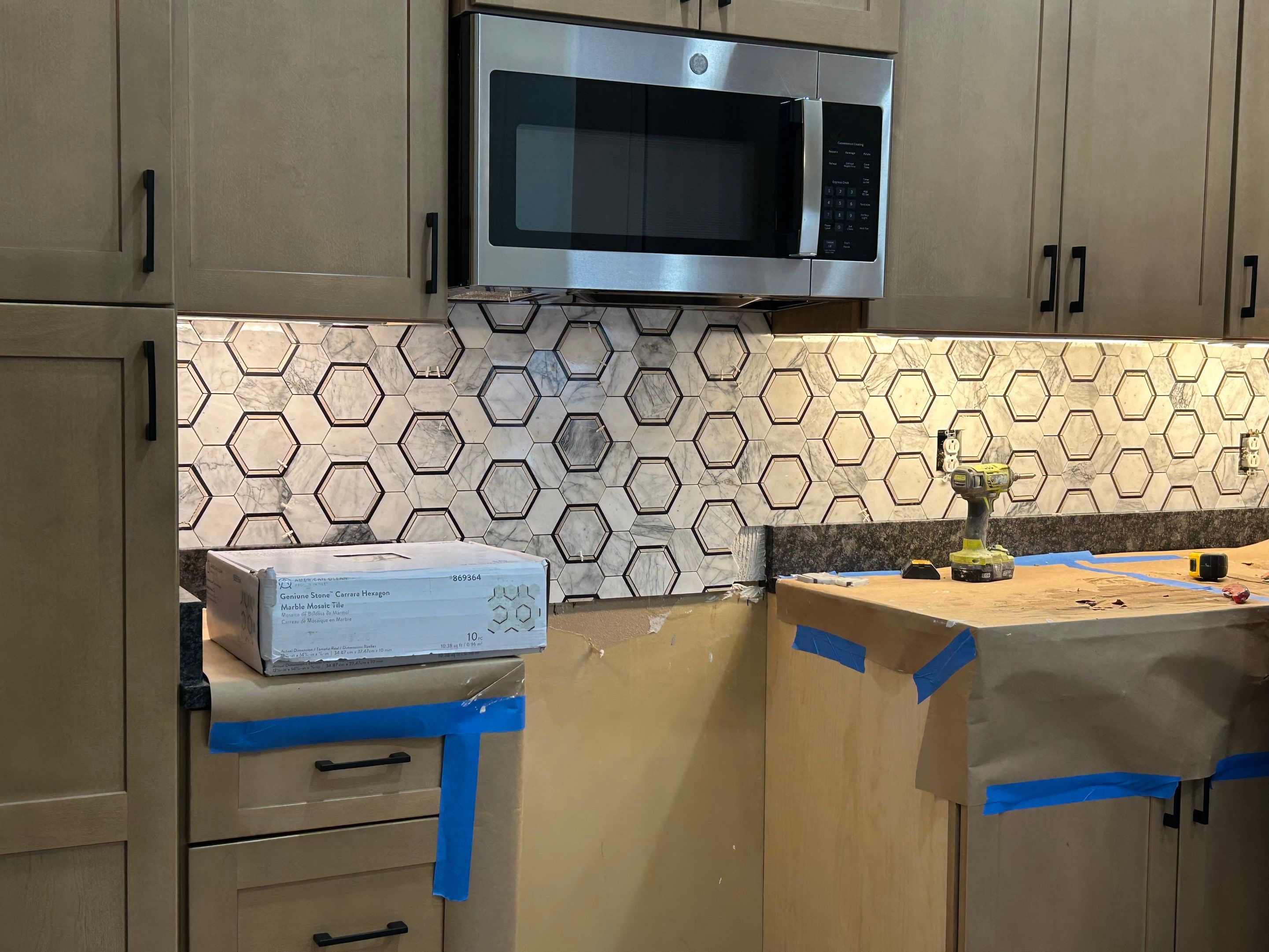 Hexagonal Marble Backsplash  by Footprints Floors of Nashville