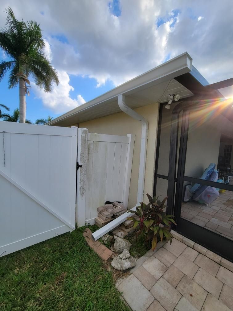 Downspout Installation using 3X4 Elbow Downspout in Cape Coral by Gutter Professors