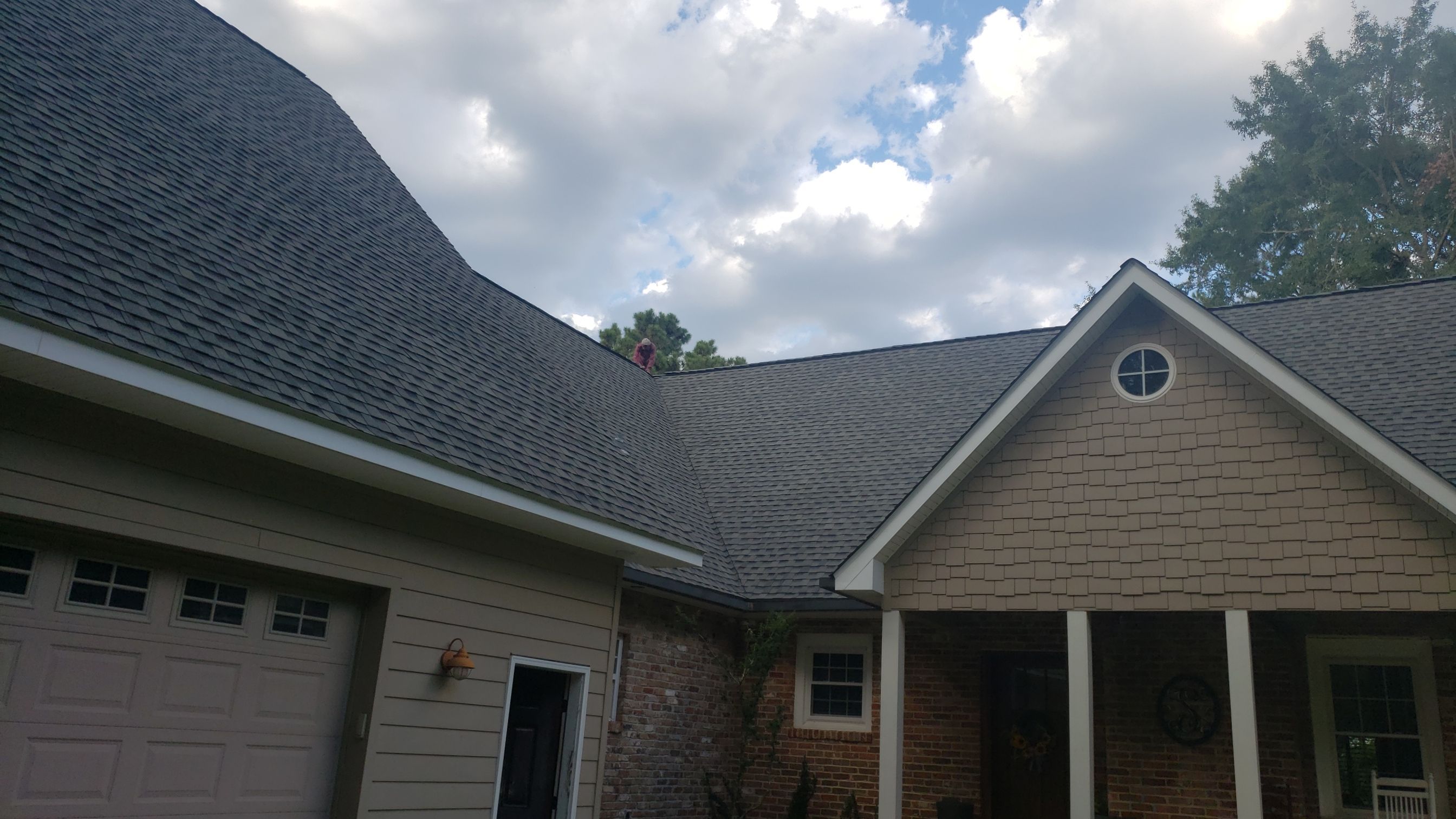Residential Roofing Installation using Roof Replacement by American Roofing & Construction LLC