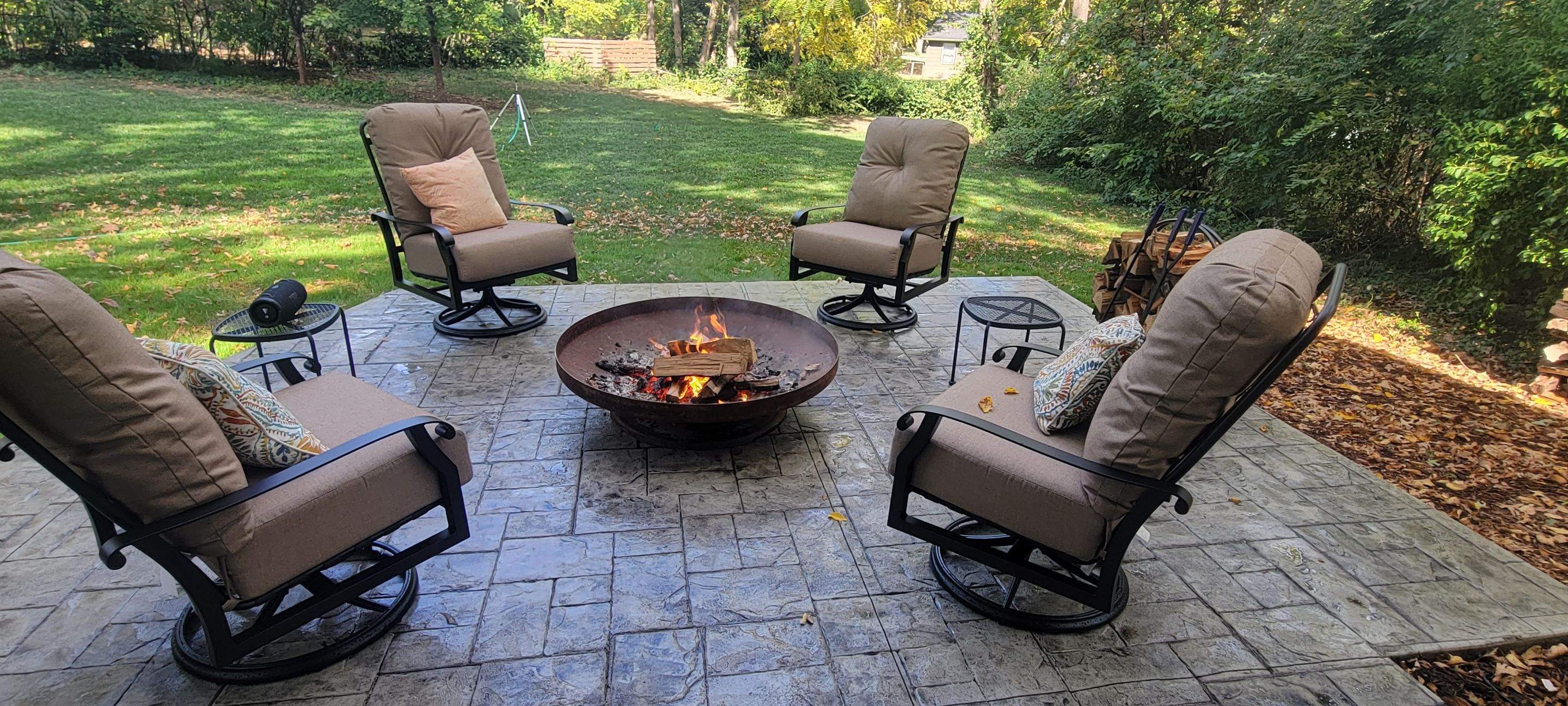 Back Yard Cantilivered Patio by LAND ESCAPES LLC