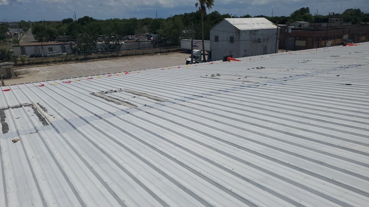 Commercial Roofing Installation using GAF 10 Year Acrylic System by Lighthouse Roofing