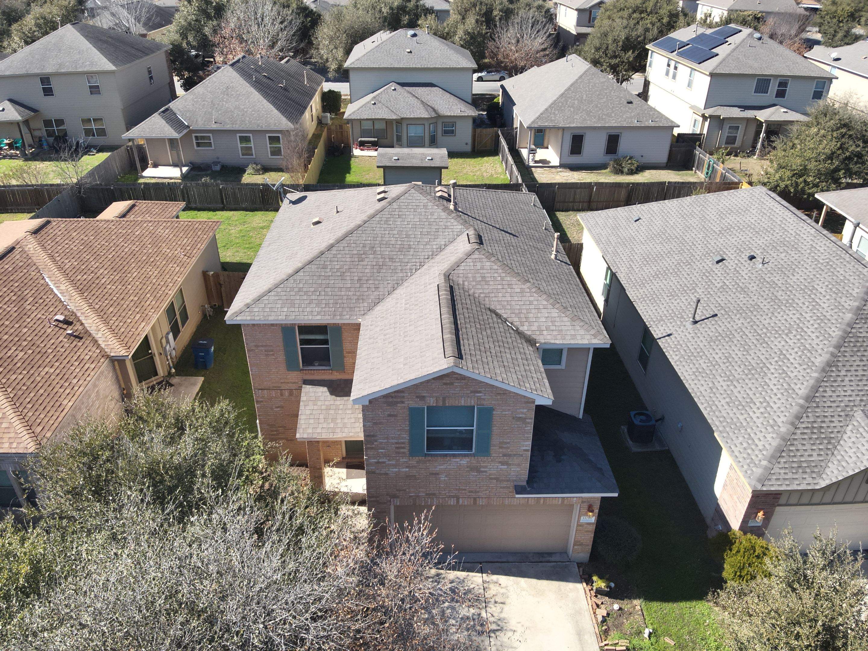 Residential Roof Replacement using Owens Corning - Duration - Driftwood by Action Exteriors Austin