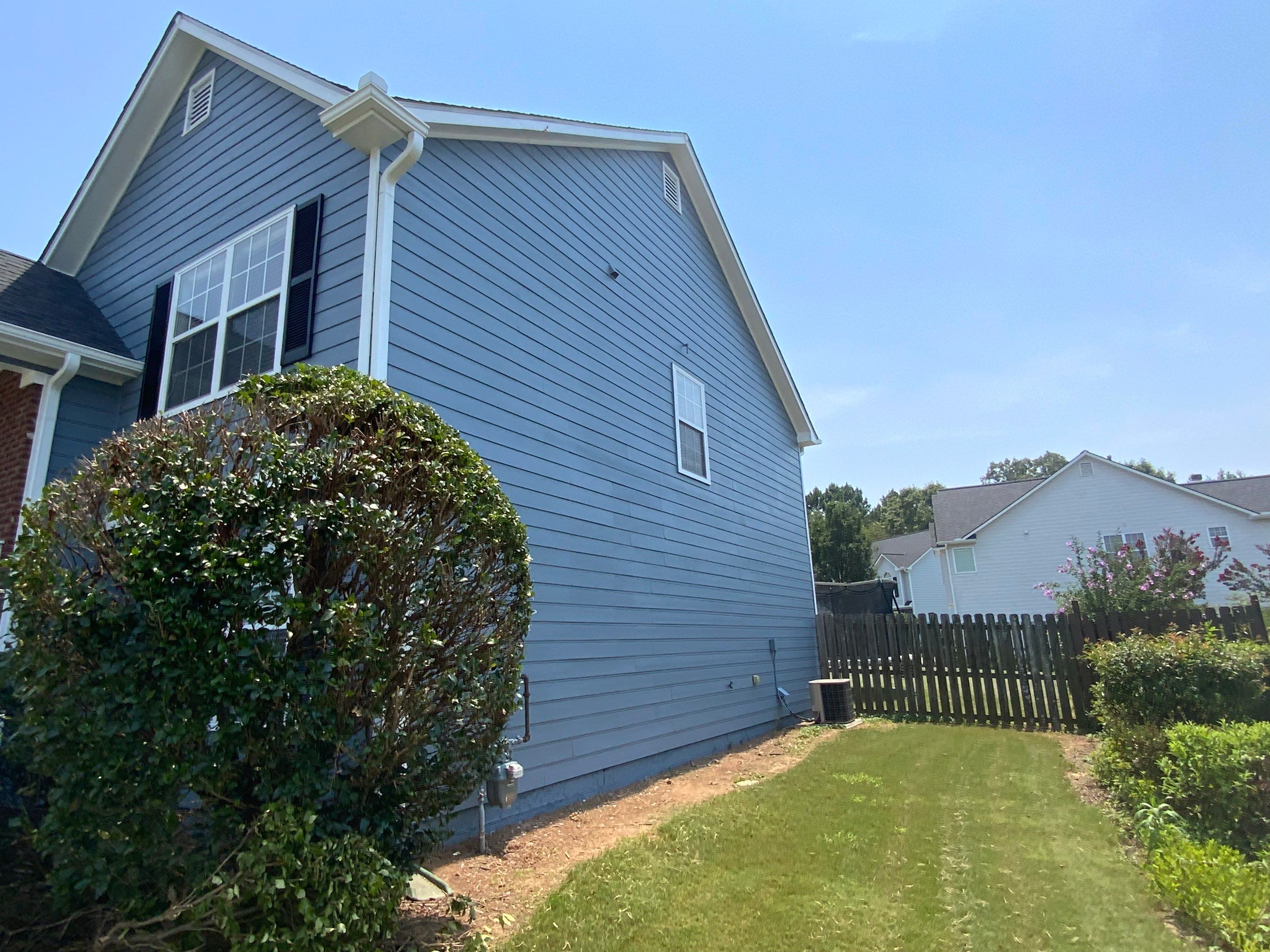 Comprehensive Exterior Painting for Cartersville Home with Blue Siding Transformation by Swift Home Renovations