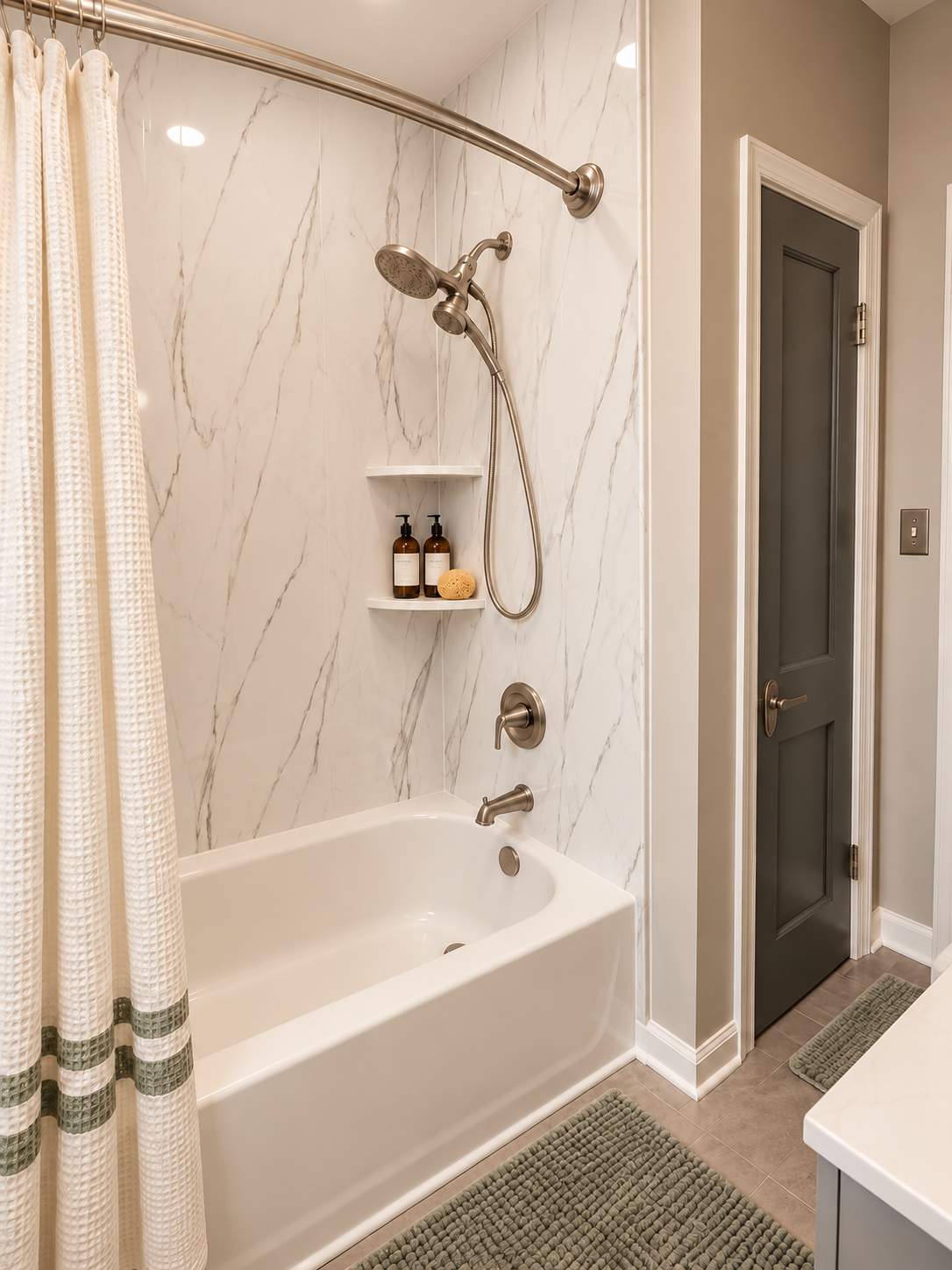 Modern Bathroom Remodel with Marble-Look Tub Surround by Remodel Now