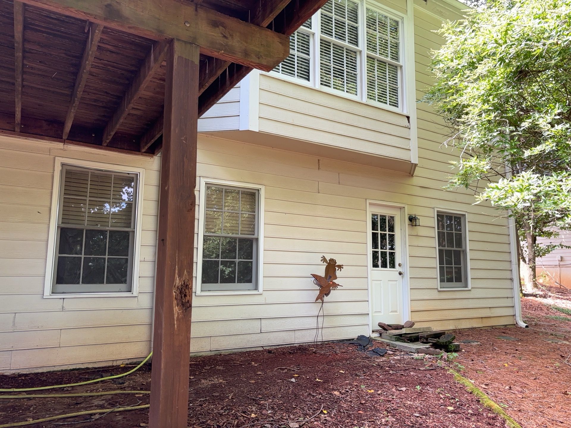 Blue Exterior Paint and Siding Installation using James Hardie Lap Siding by Nelson Exteriors
