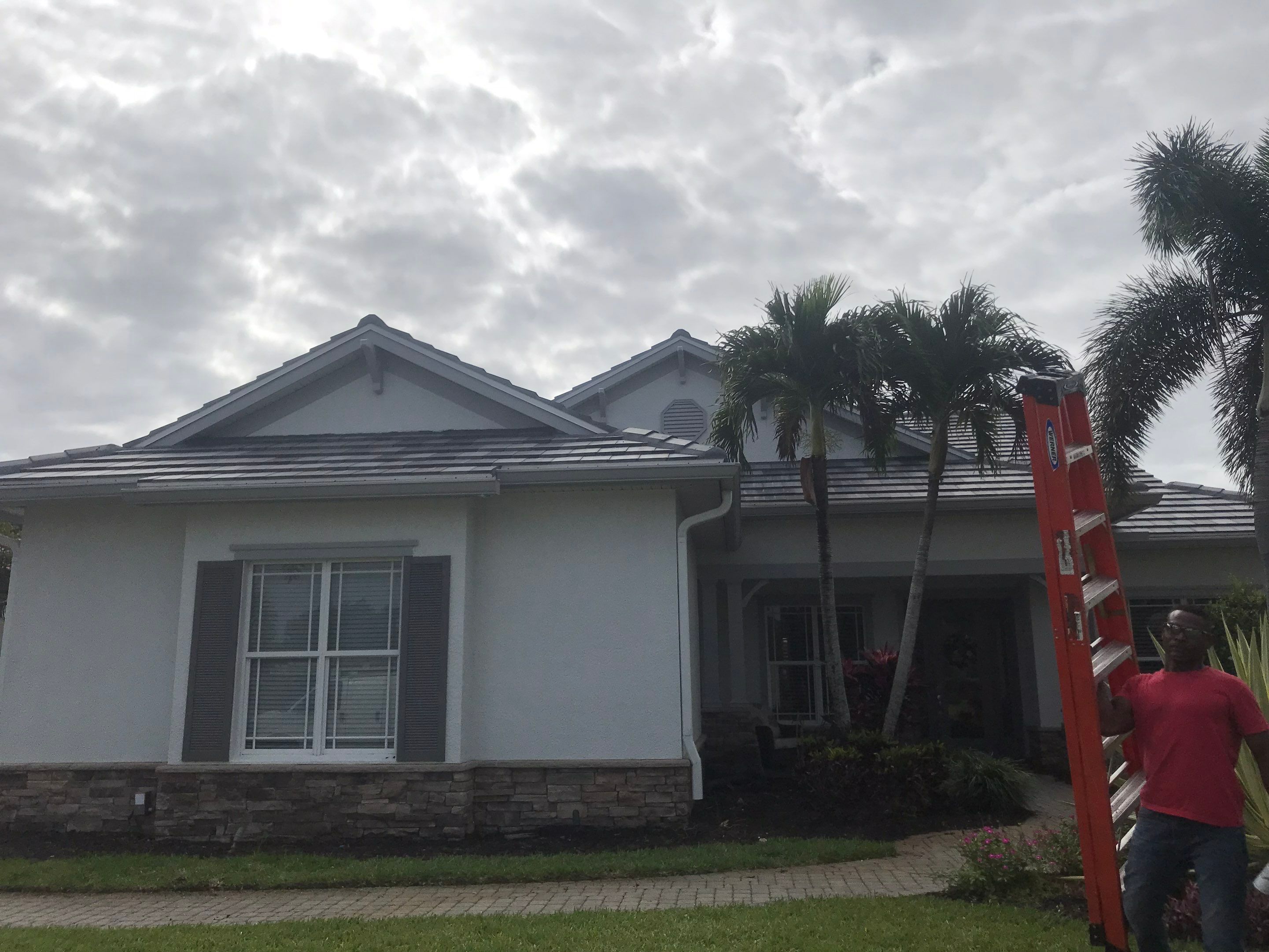 7-inch Grey Gutter Installation and White Downspouts in Fort Myers FL  by Gutter Professors