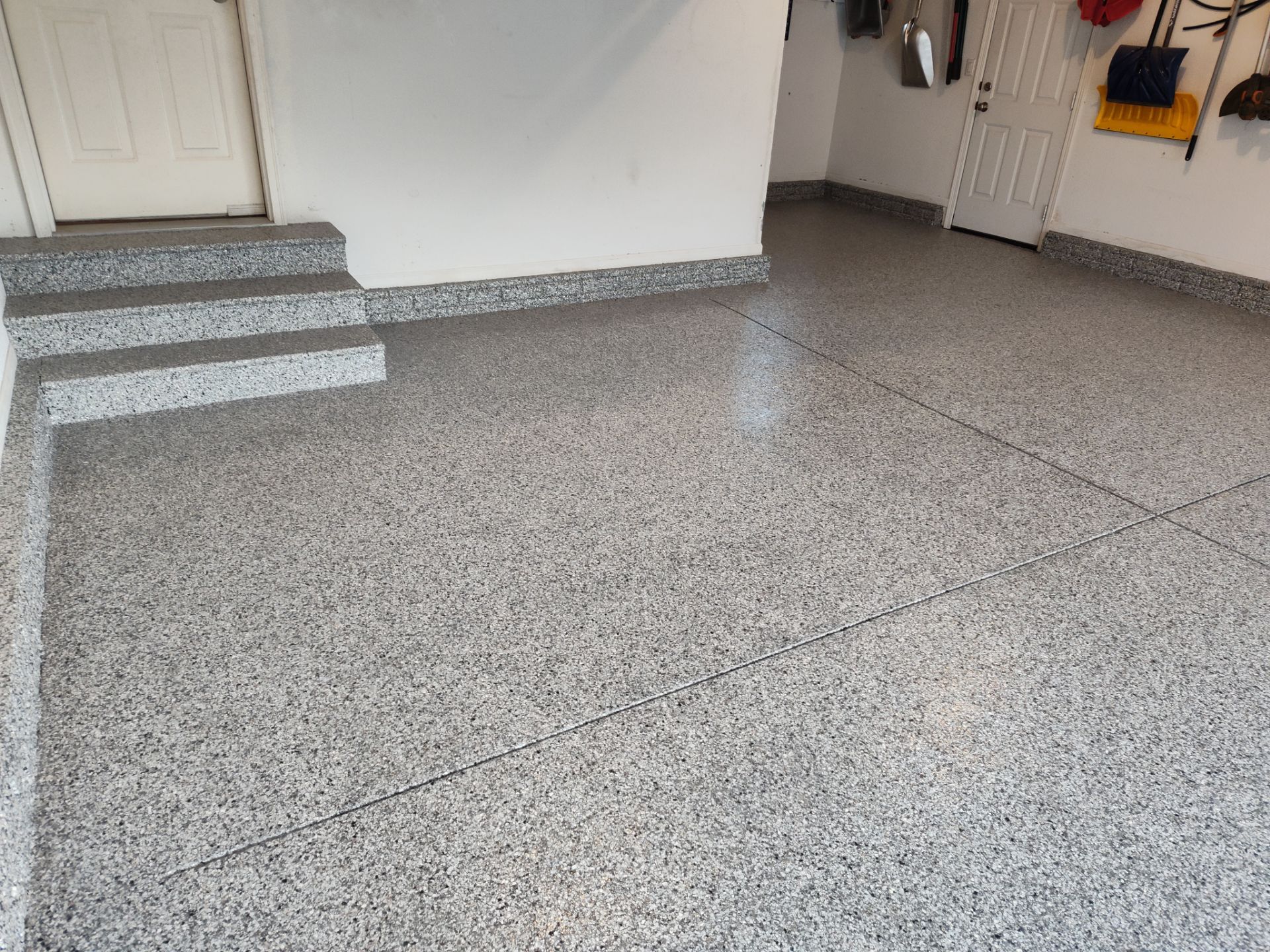 A Garage In One Day Keeps the Rock Salt Away! by Revival Concrete Coatings, LLC
