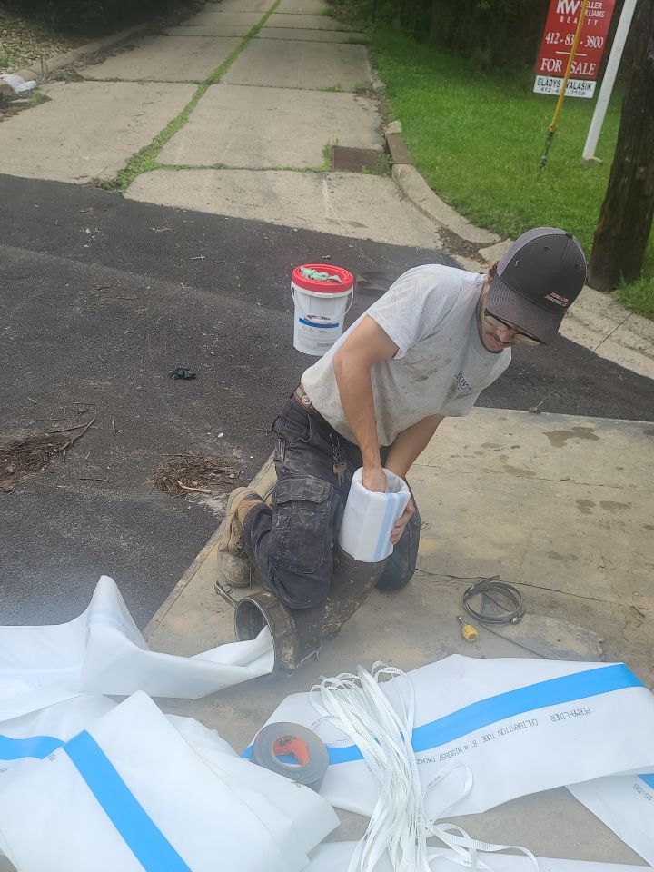 Sewer Repair using Perma-Liner through two manholes by Sureway Comfort John Wilcox Plumbing Heating Cooling