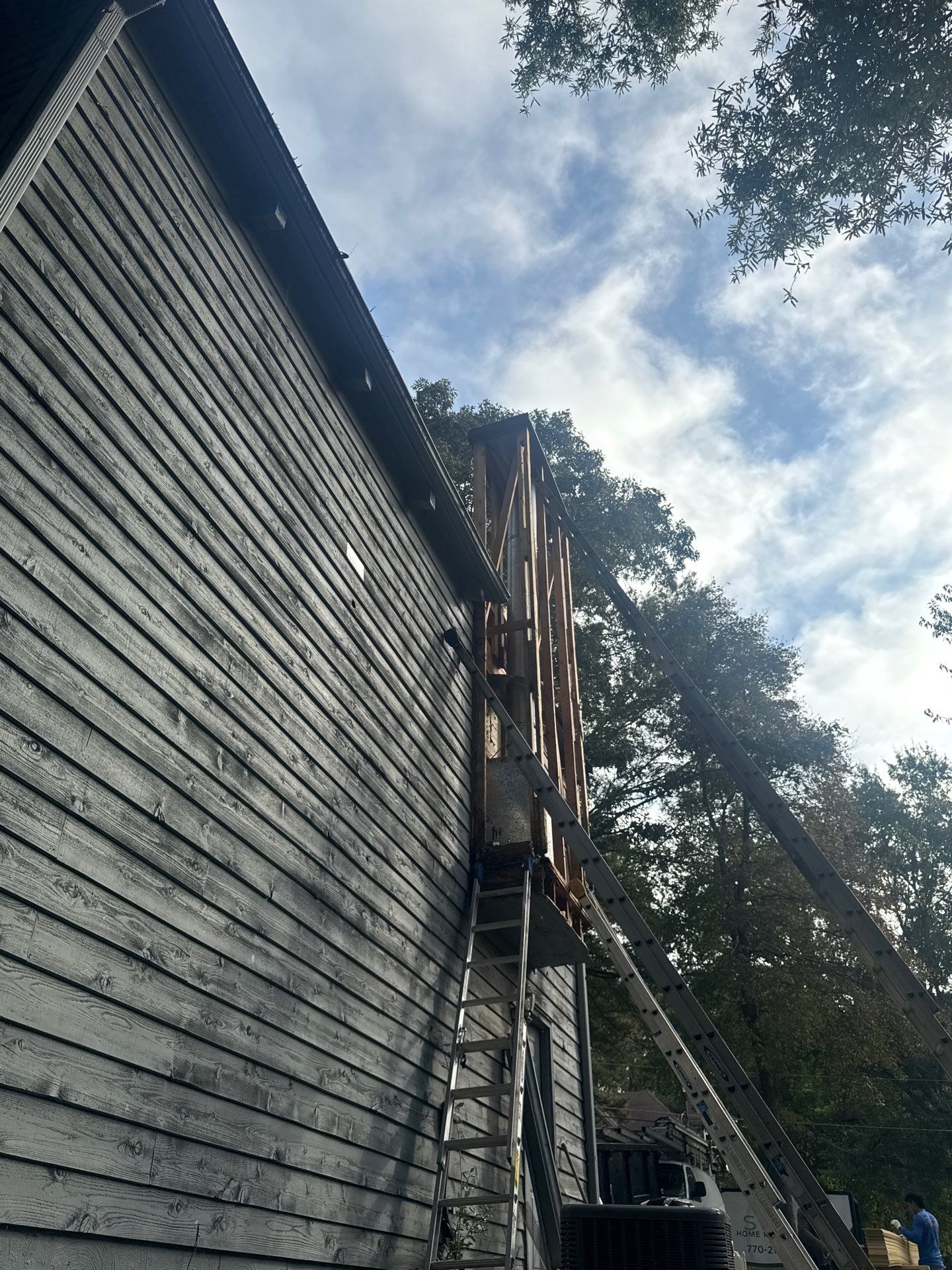 Chimney Chase Siding Replacement and Exterior Painting in Cartersville by Swift Home Renovations 