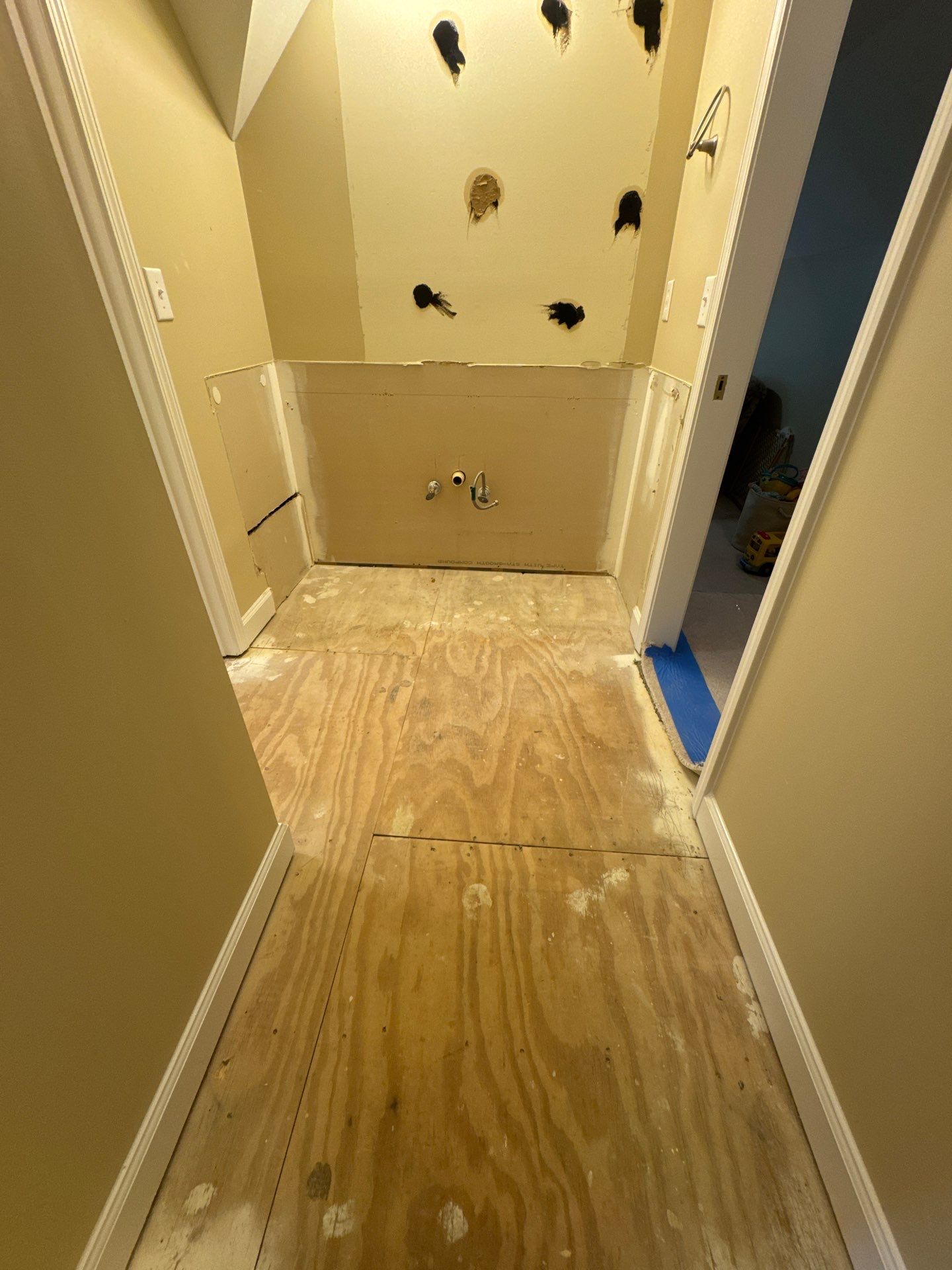 Marietta Bathroom and Laundry Room Floor and Vanity Remodel by Swift Home Renovations