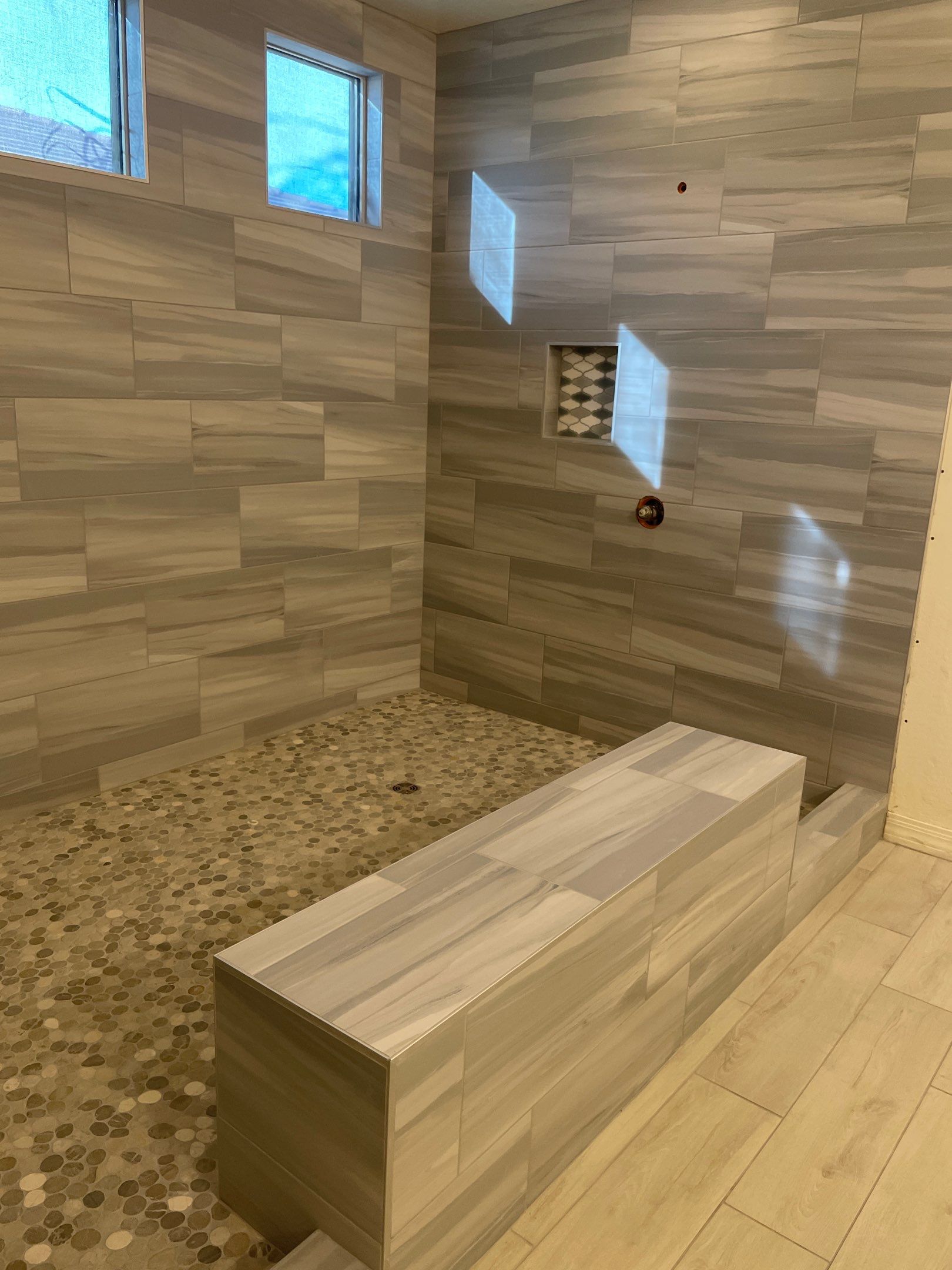 Wood Look Tile Floors and an Extra Large Shower  by Footprints Floors of Chandler 