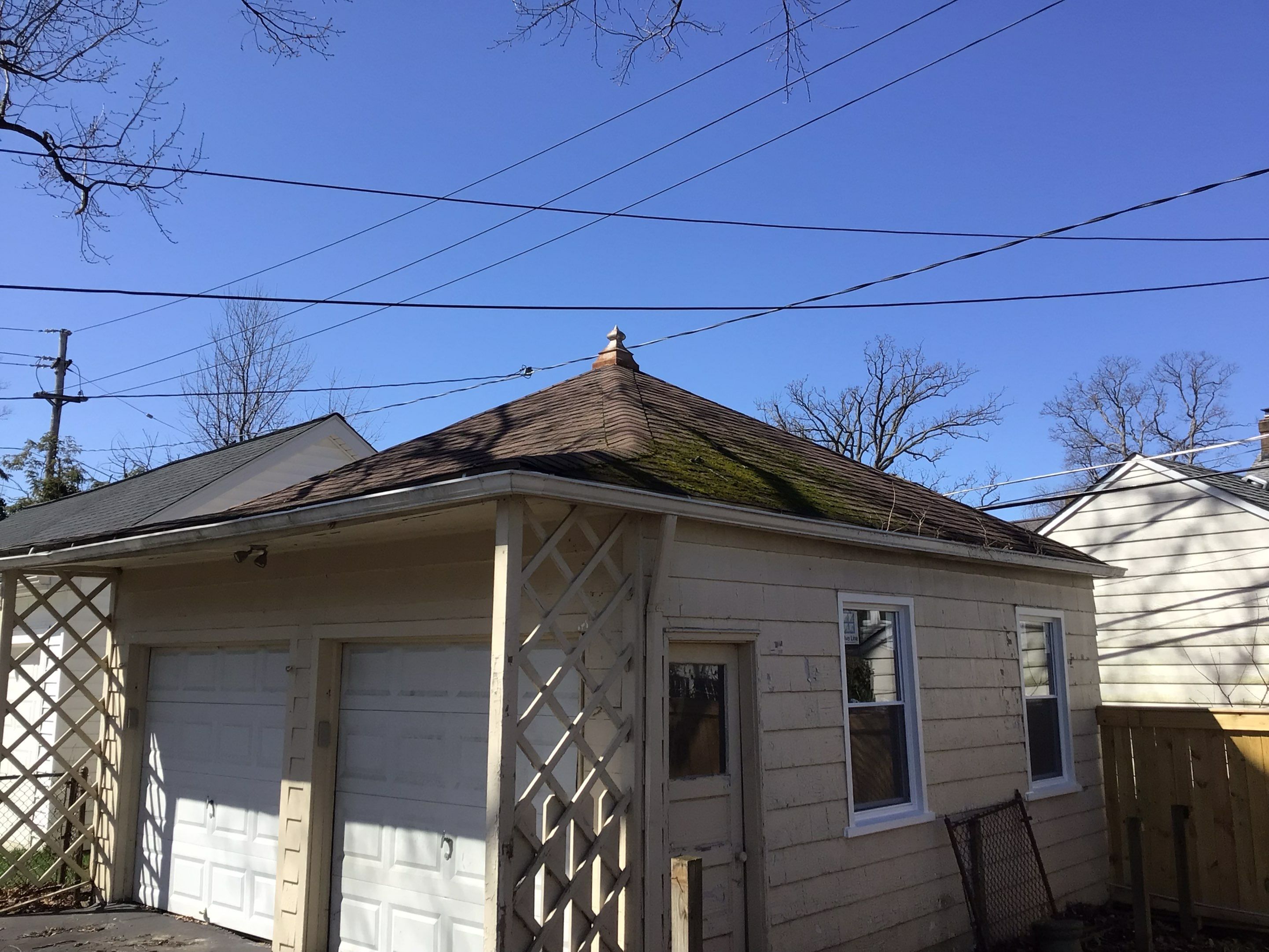 Residential Roofing Installation, Dec-tek walk-out porch roof, siding on garage by Absolute Roofing and Construction