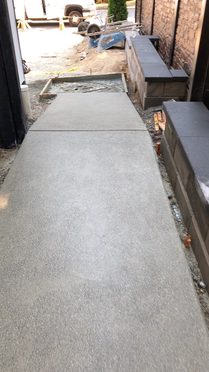 Bruce | Broom Finish Driveway, Concrete Project by Jireh Asphalt & Concrete Inc 