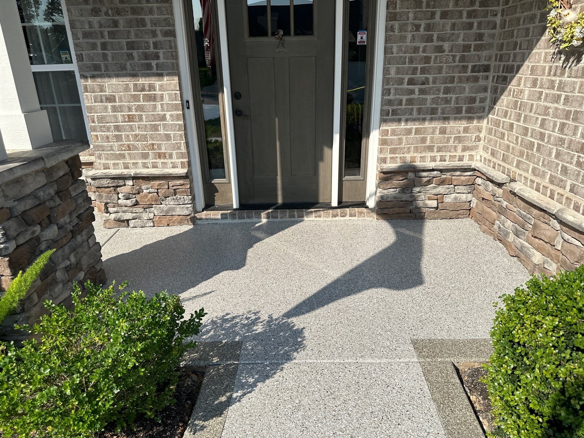 Driveway Improvement Using Claystone With Trail Mix Border! by Elite Floor Solutions