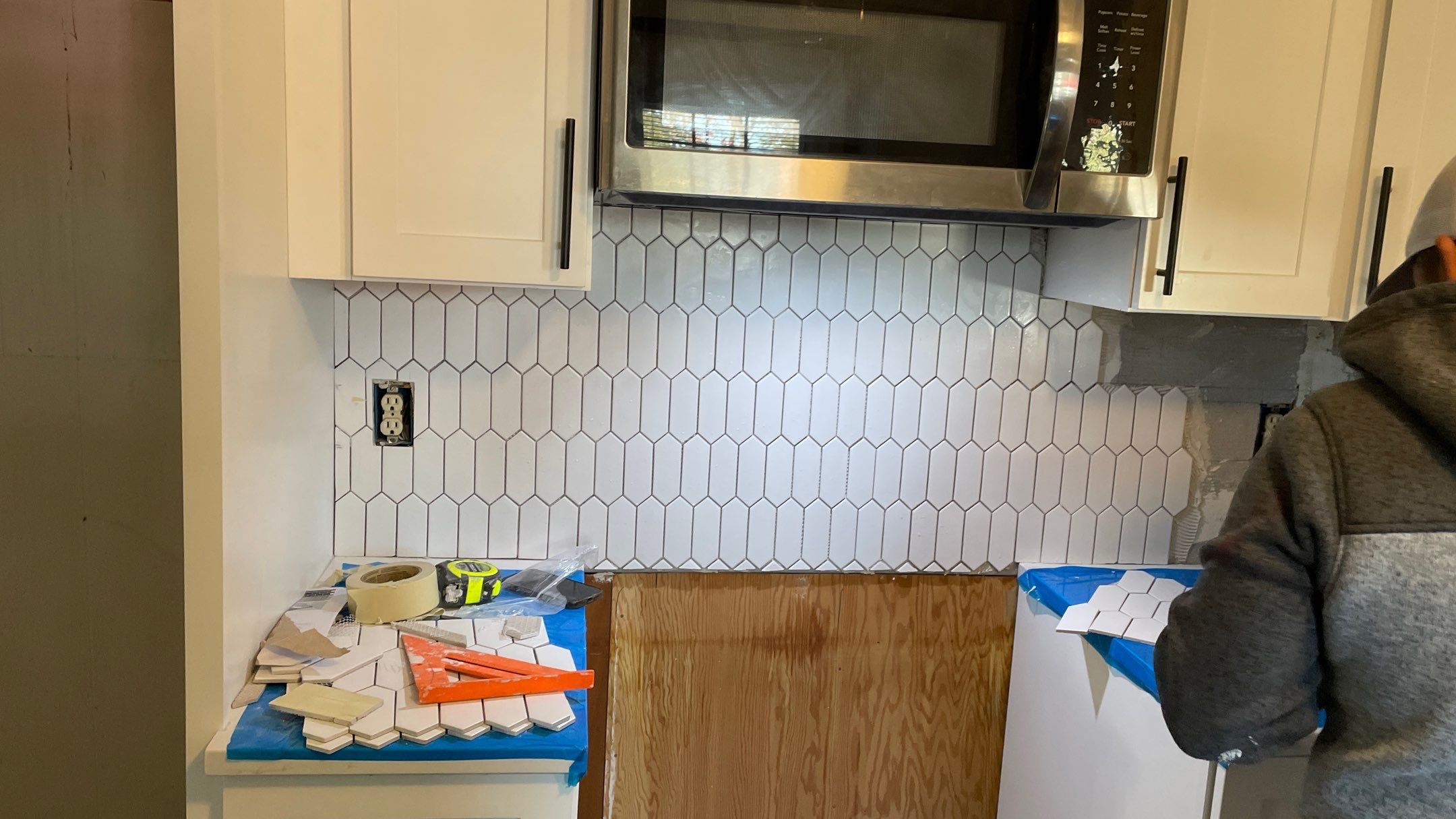 Kitchen Backsplash and Herringbone Tile Floor Remodel by Footprints Floors of Coastal Carolina