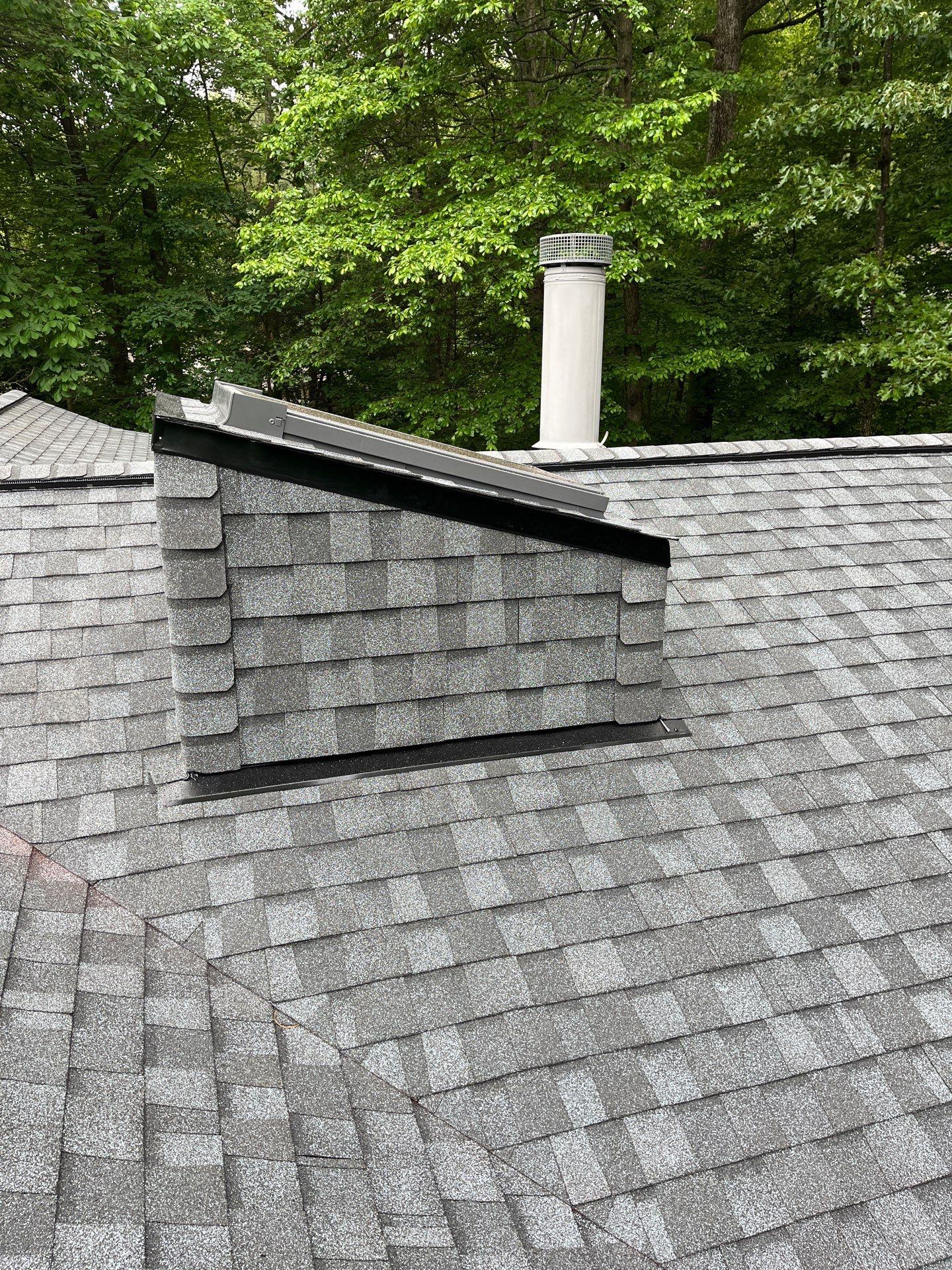 Oakton: Roof Replacement With CertainTeed Landmark Designer Shingles in Pewter by RM Banning, Inc.