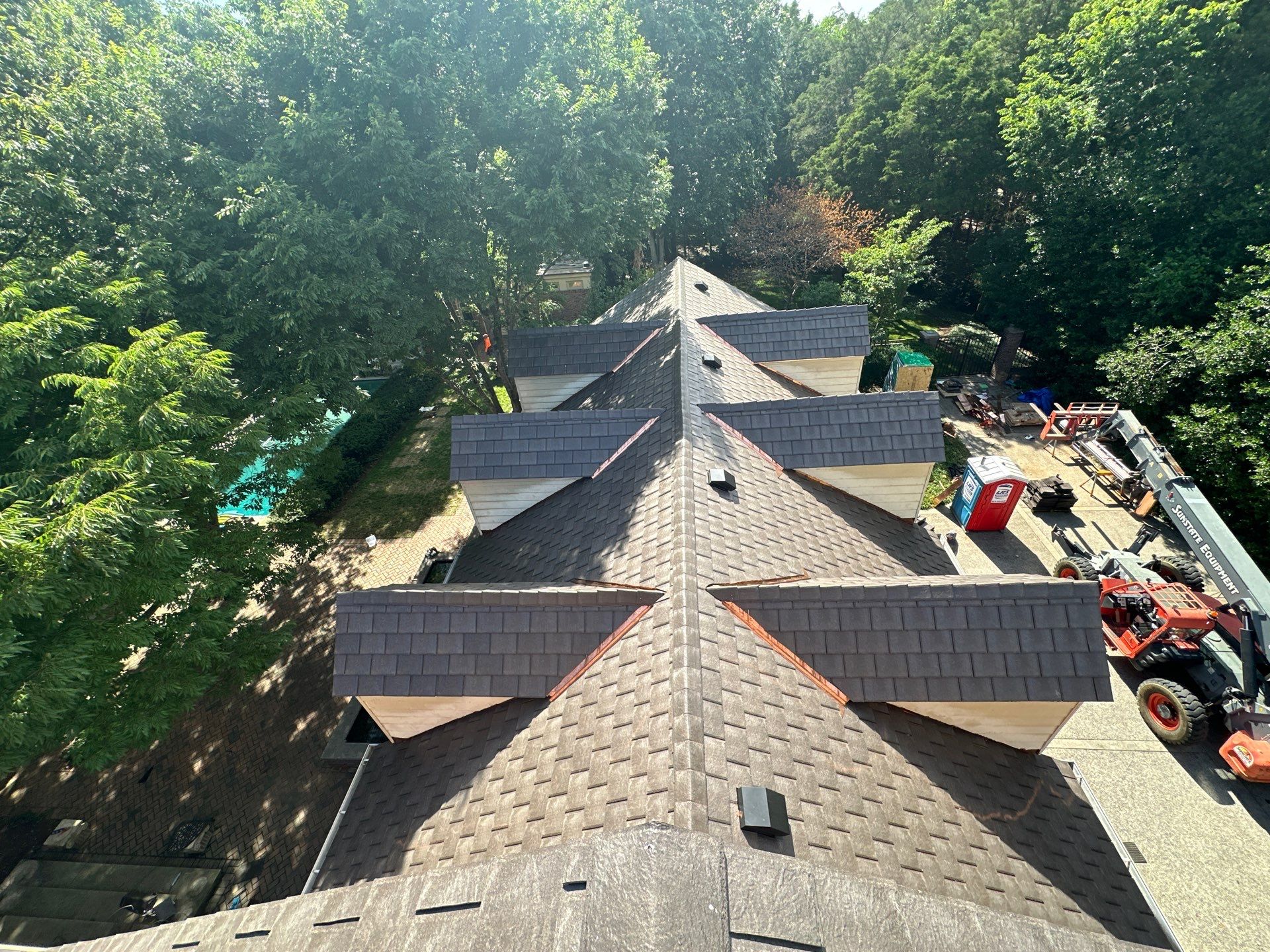 Residential Roofing Installation Using Enviroshake Synthetic Slate by Undersun Roofing 