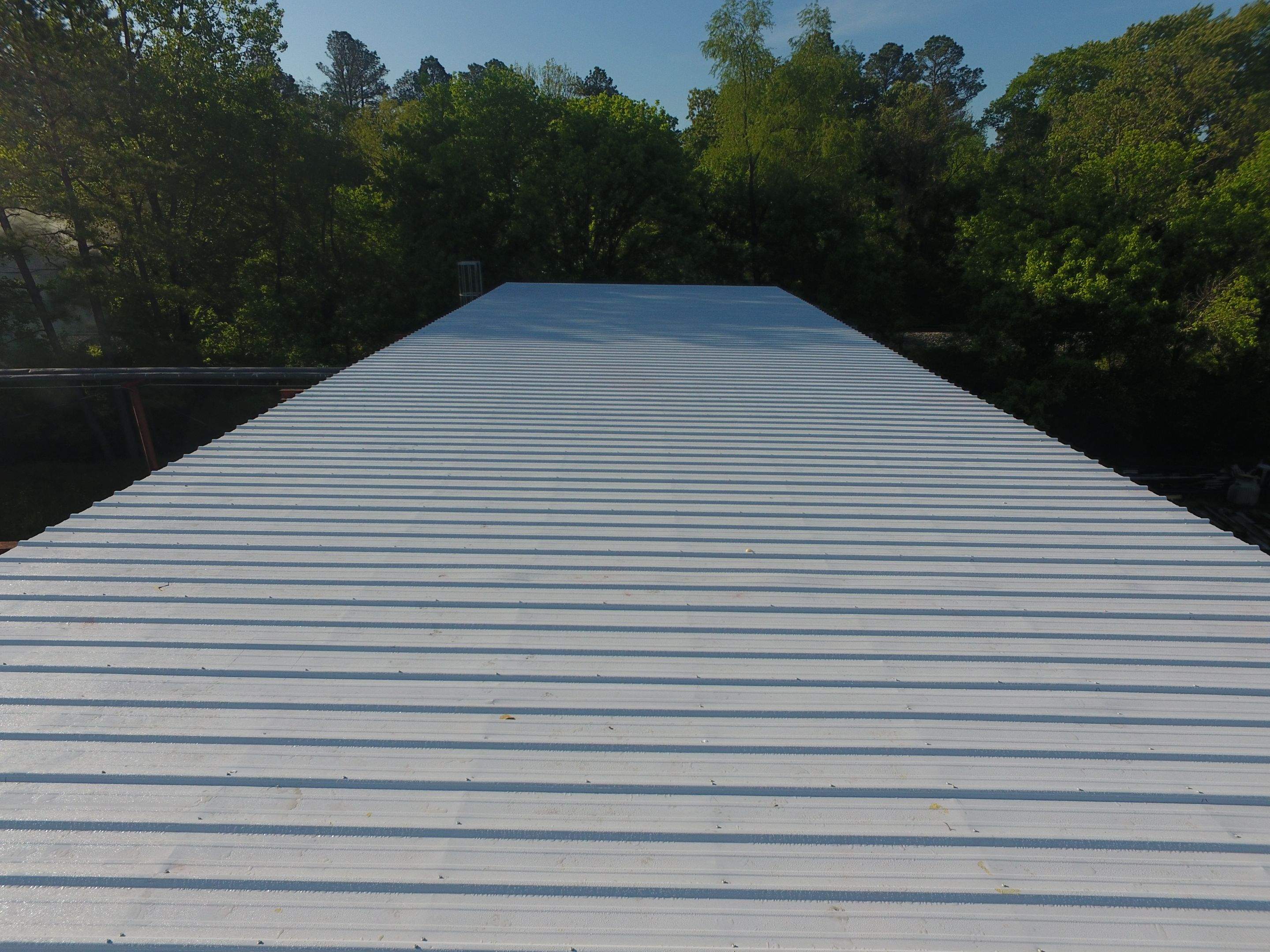 Commercial Roofing Installation using Aluminum Roofing panels by Hostetler Roofing